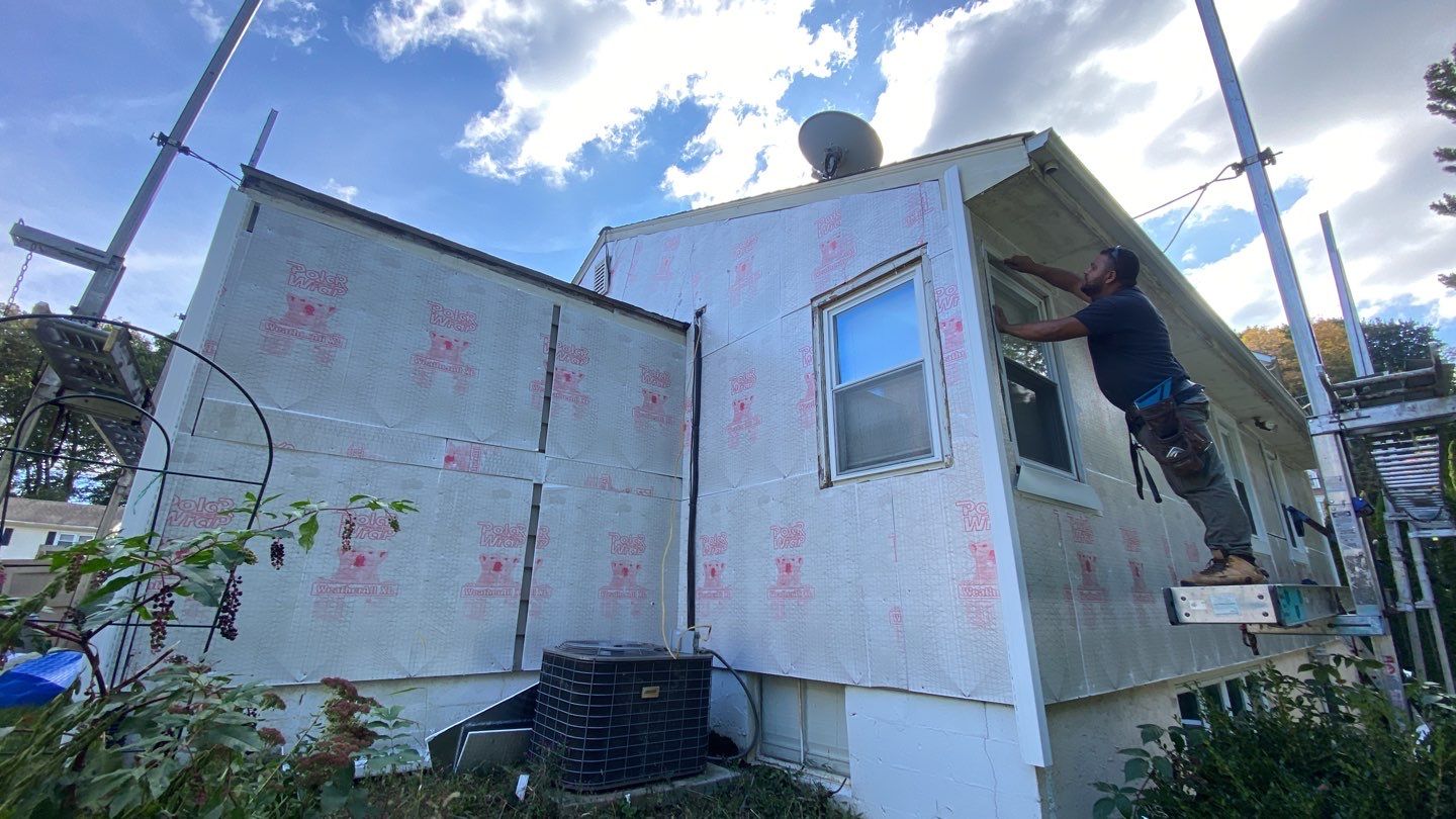 Siding Installation using CertainTeed monogram 4" double 4 Charcoal Gray by A Plus Exterior