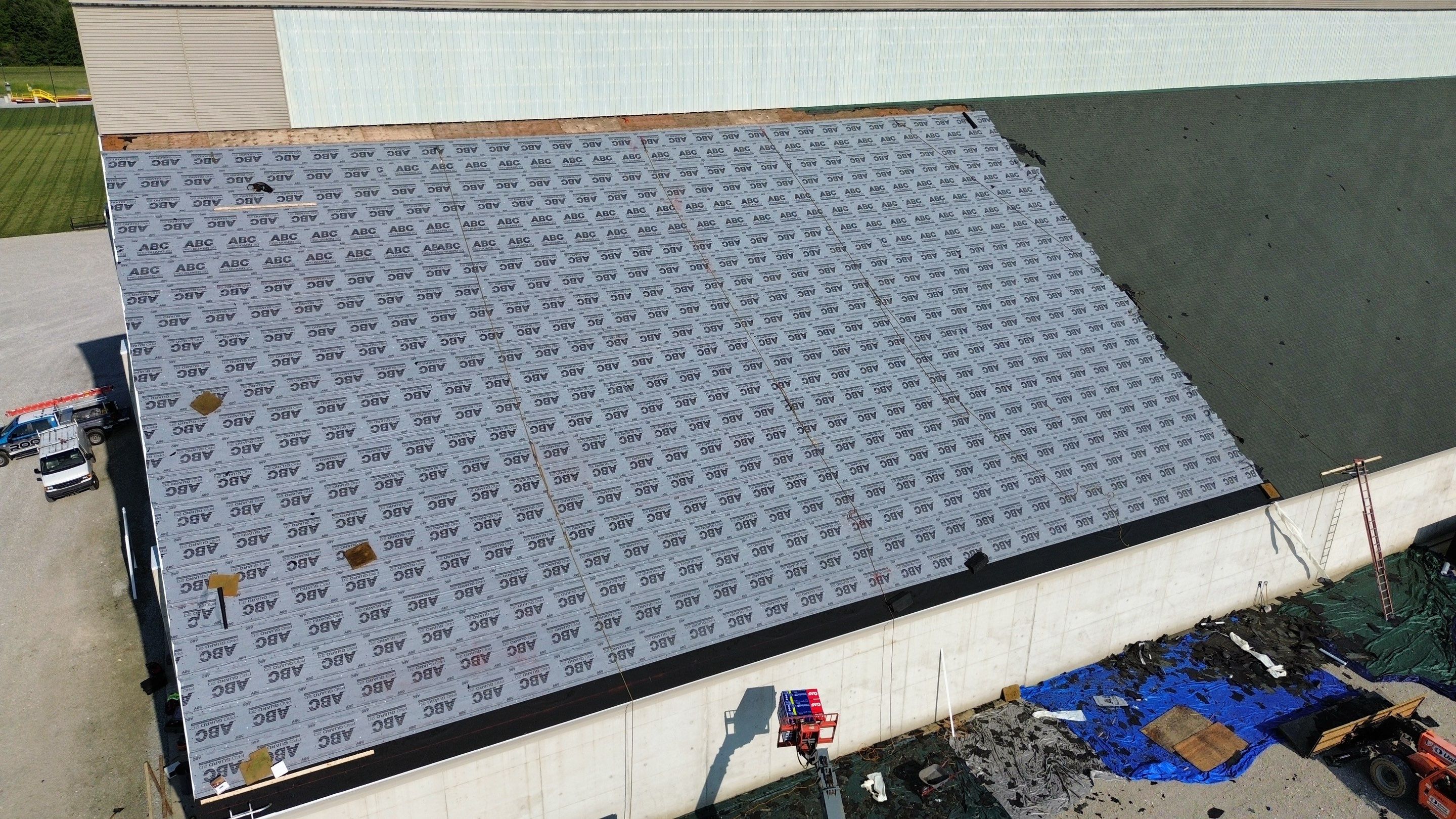 Commercial Roofing Installation using Timberline HDZ Shingles - Hunter Green by RoofX 