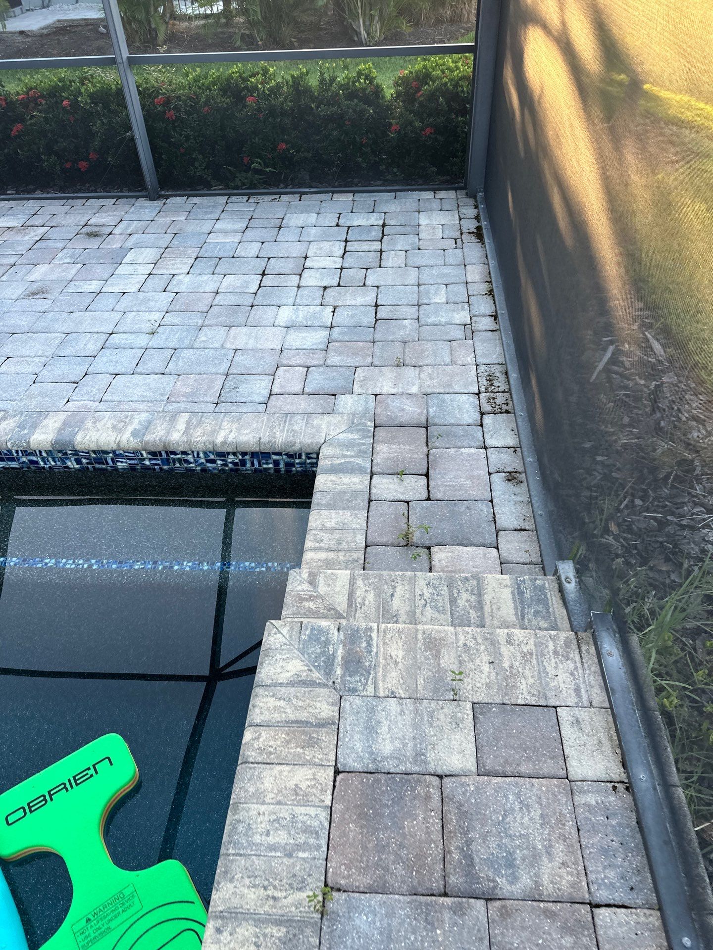 Paver Driveway, Sidewalk, and Pool Deck Cleaning in Winding River Community, Bradenton, FL by Sunshine AquaWash