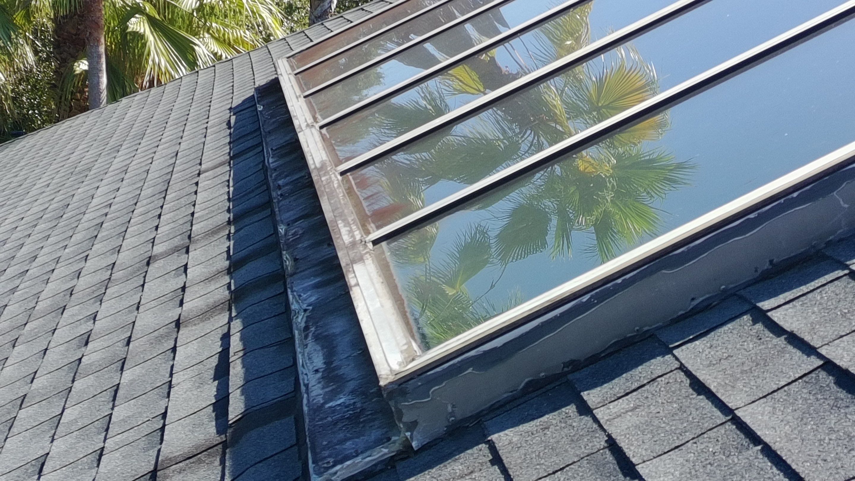 Ridge Skylight Repair and Shingle Roof Maintenance in Winter Park by Fortified Roofing Solutions Corp.