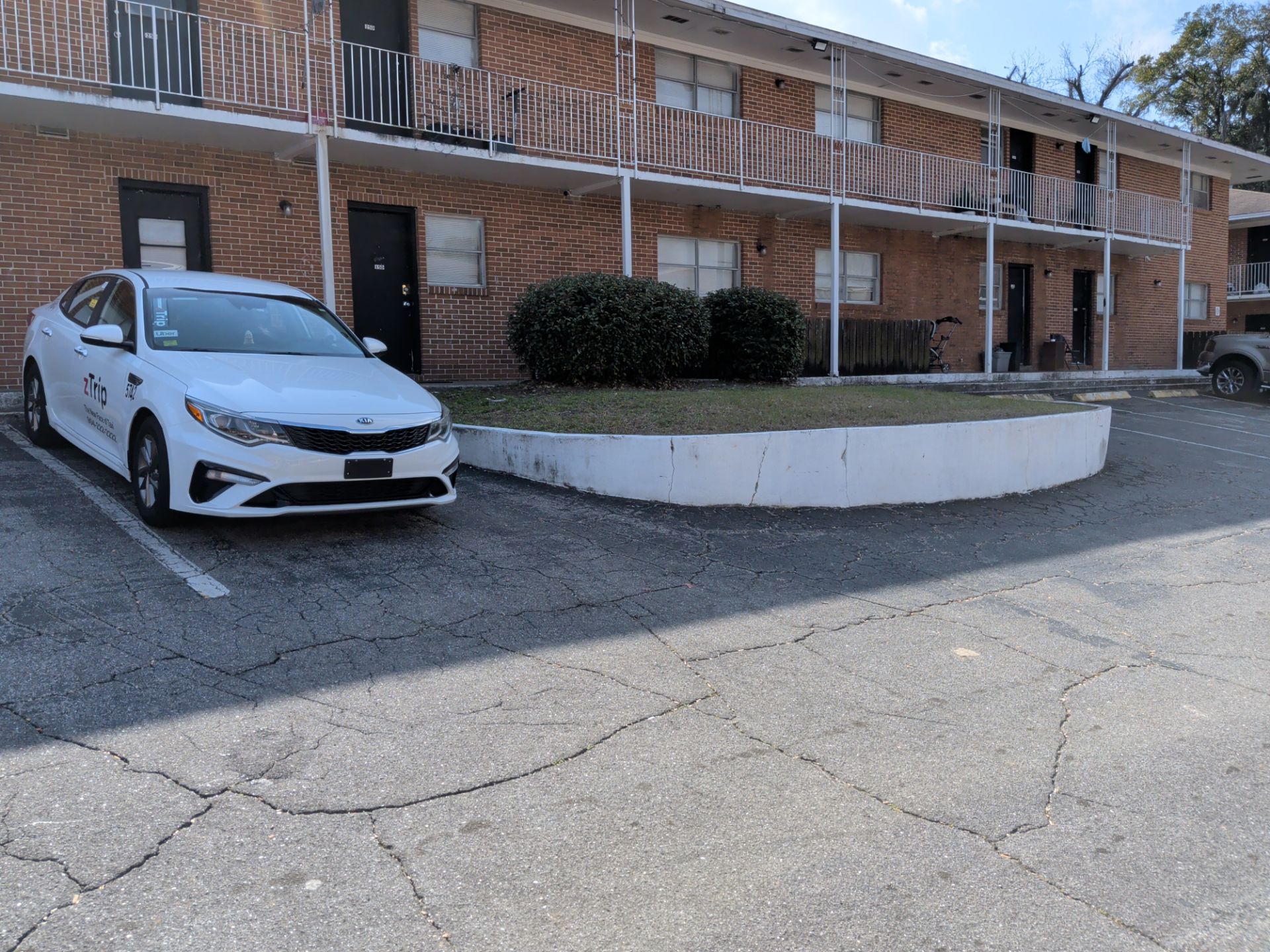 Apartment Landscape Cleanup & Ongoing Grounds Maintenance — Cimarron Apartments (Arlington) by Harmoni Home Services