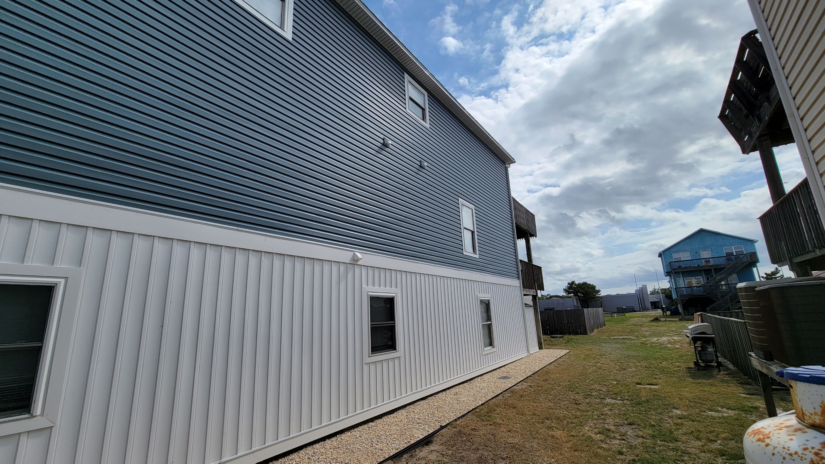 From Bland to Blue by Gallop Roofing & Remodeling, Inc.