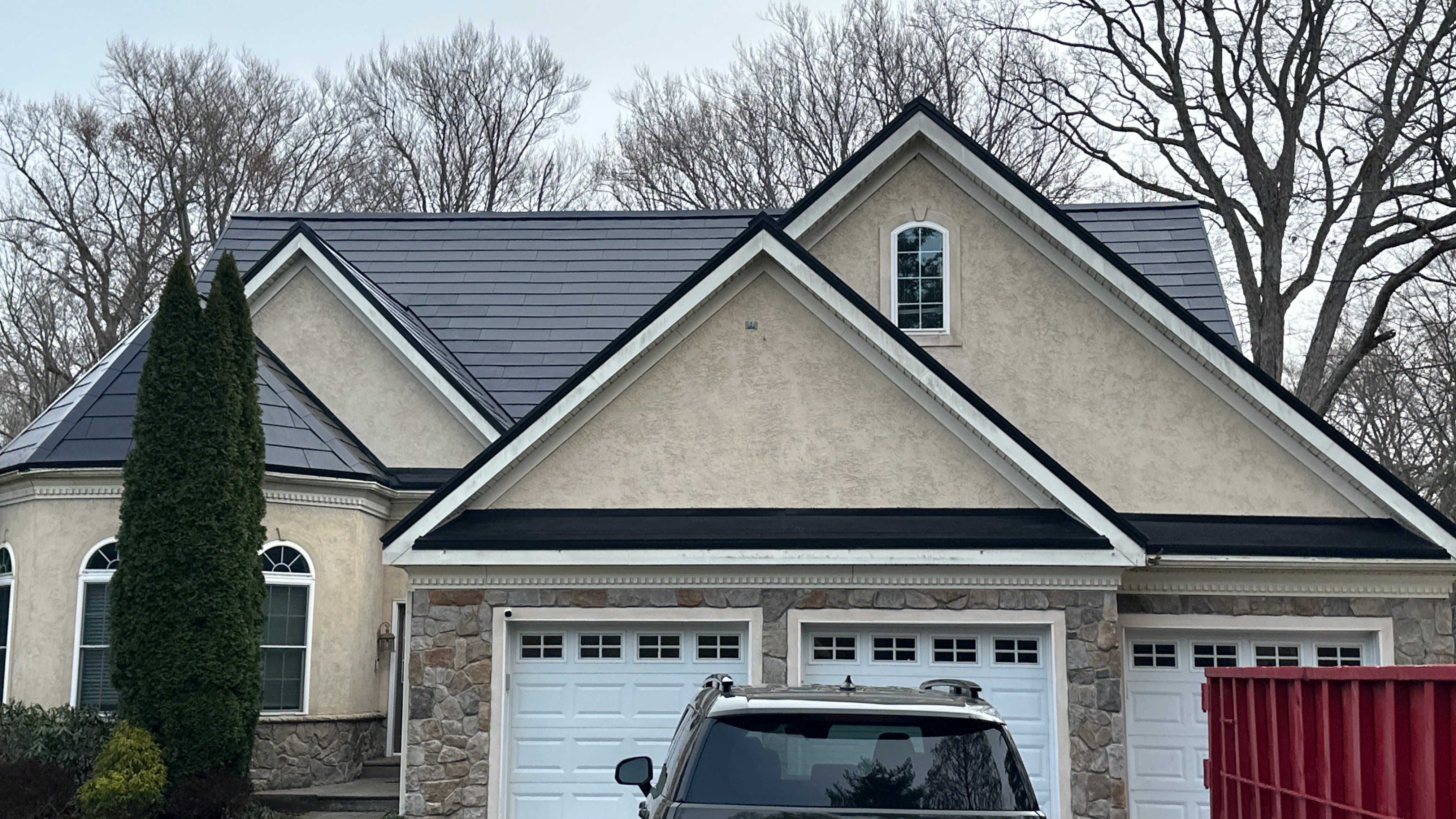 Tesla Solar Roof  using Tesla Powerwall by American Home Contractors