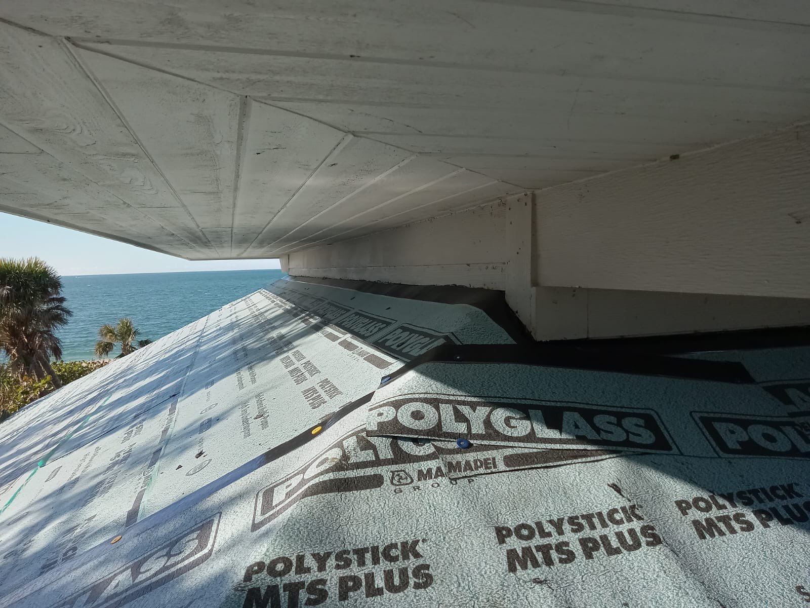 Residential Roofing Installation using Gulf Coast Metals Gulf Seam Panels by Four Peaks Roofing