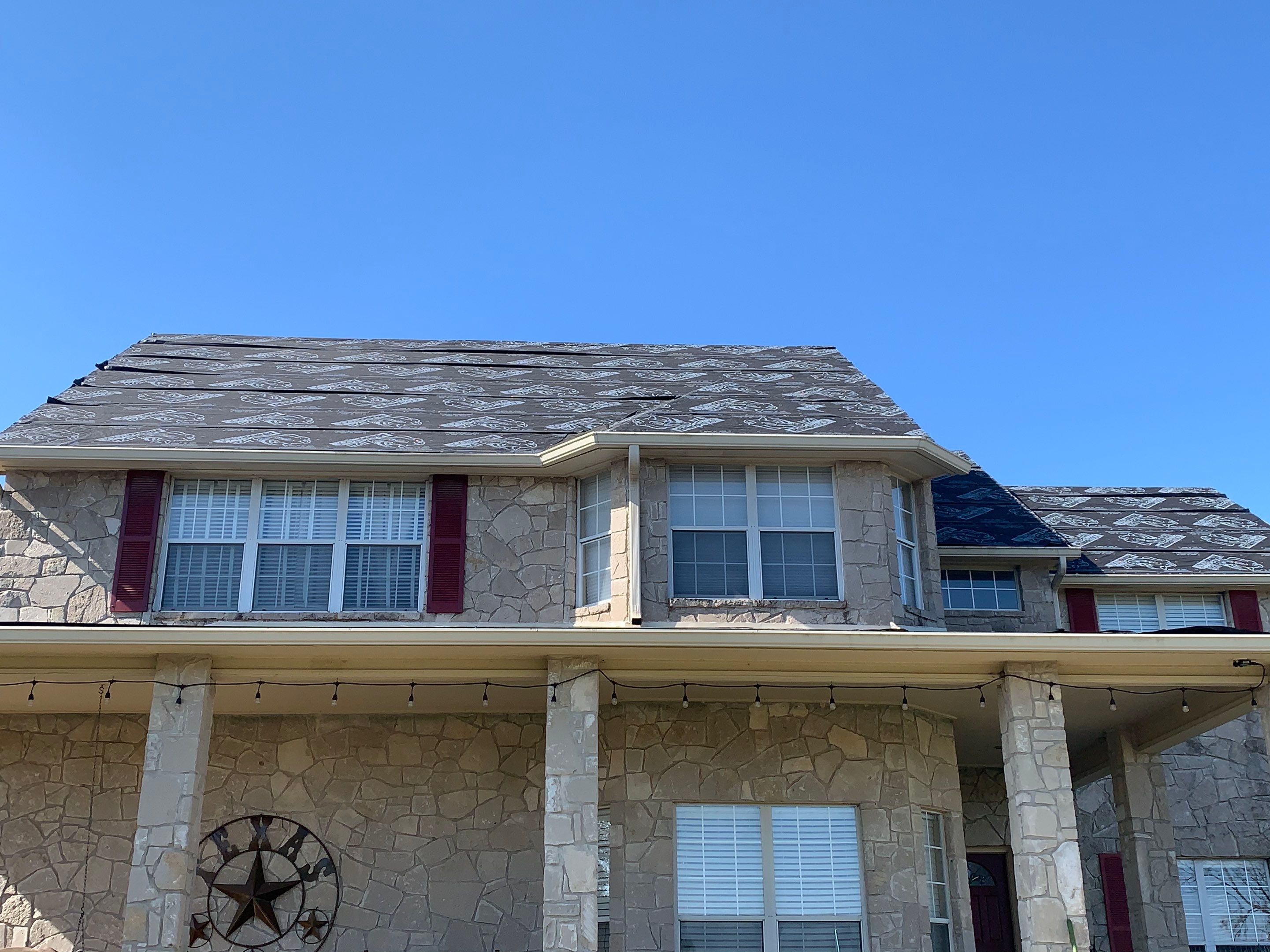 Residential Metal Roof Installation using McElroy Metal by Premier Roofing and Contracting