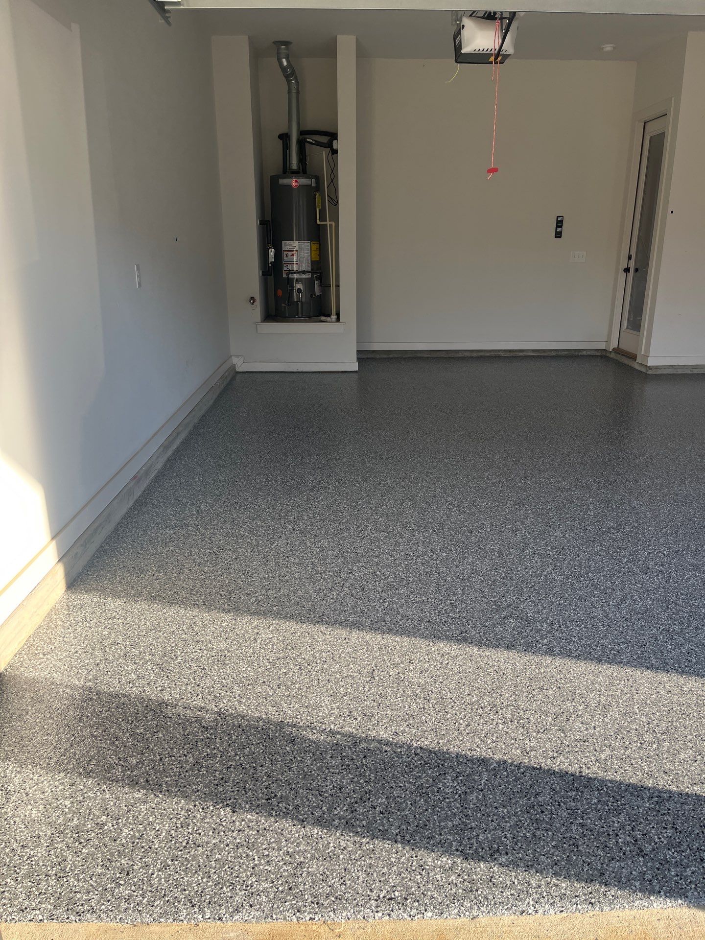Garage Floor Coating using Wombat by My Garage Floor Guys