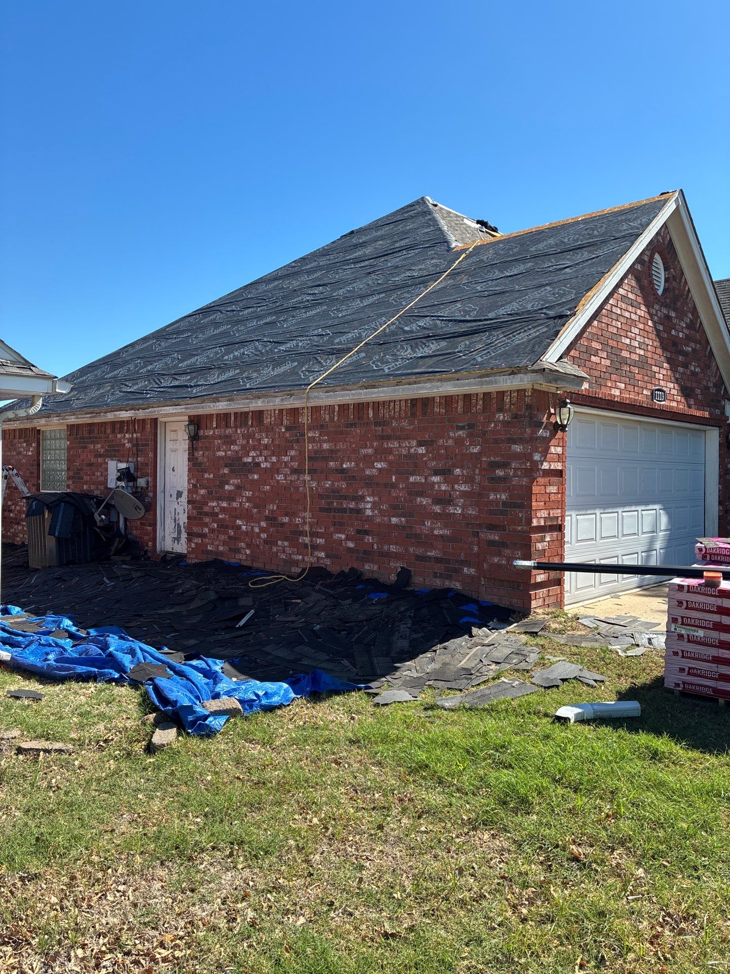 Black roof & gutters!! by In & Out Construction & Remodeling, LLC