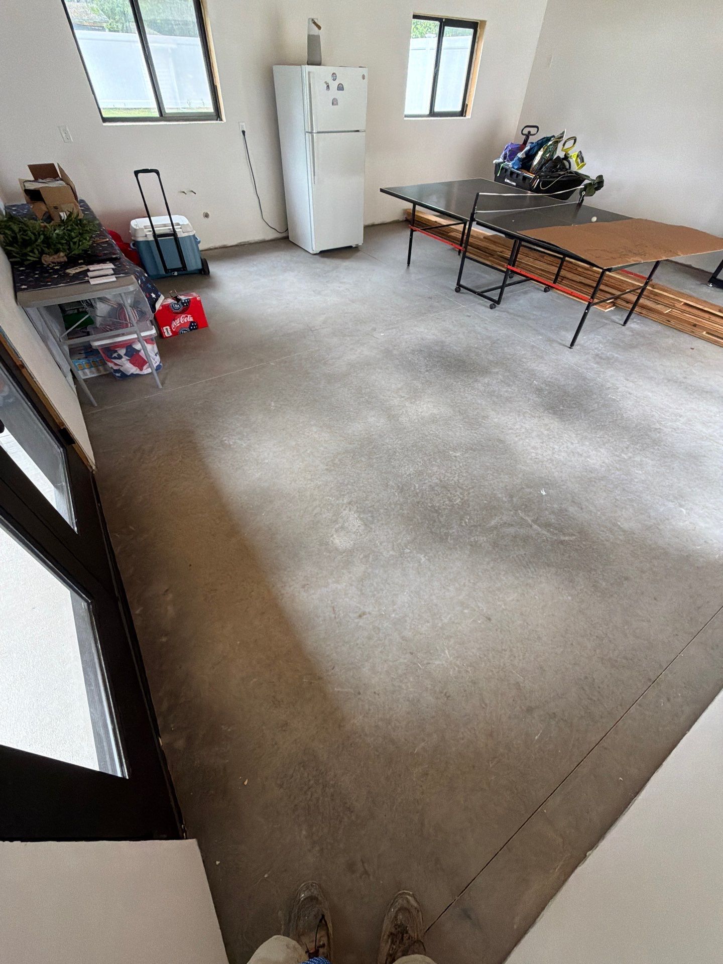 Multi-Room Epoxy Flake Floor Installation Throughout Pentwater Residence by Gordon Painting