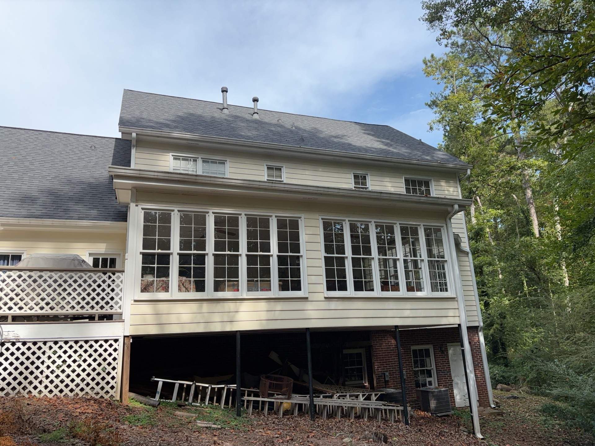 53 Window Replacements with Master 2800 Series Vinyl Replacement Windows and James Hardie Siding Installation by Nelson Exteriors 