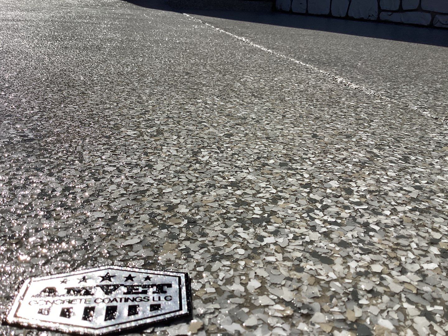 Driveway using Mt Everest by Amvet concrete coatings llc