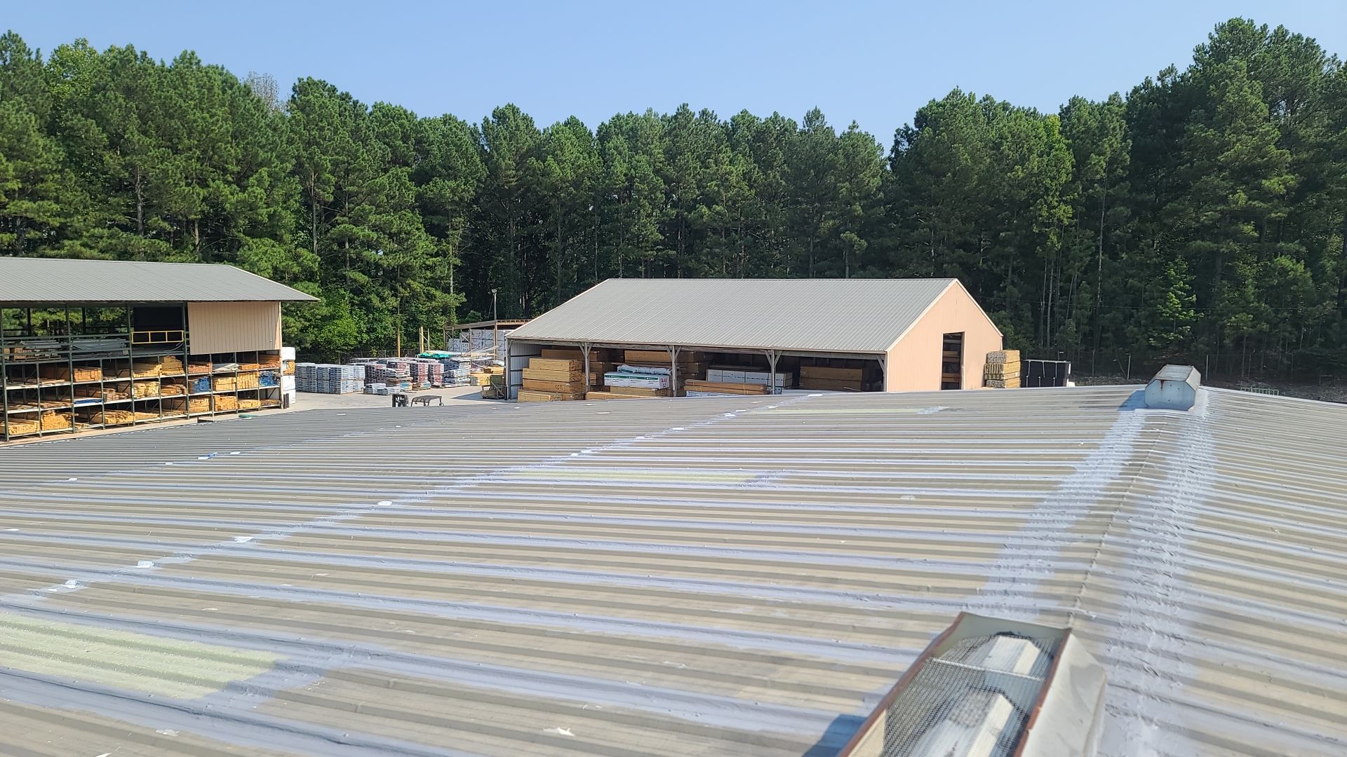 Commercial Roofing Installation using Aldocoat Coatings by Hostetler Roofing
