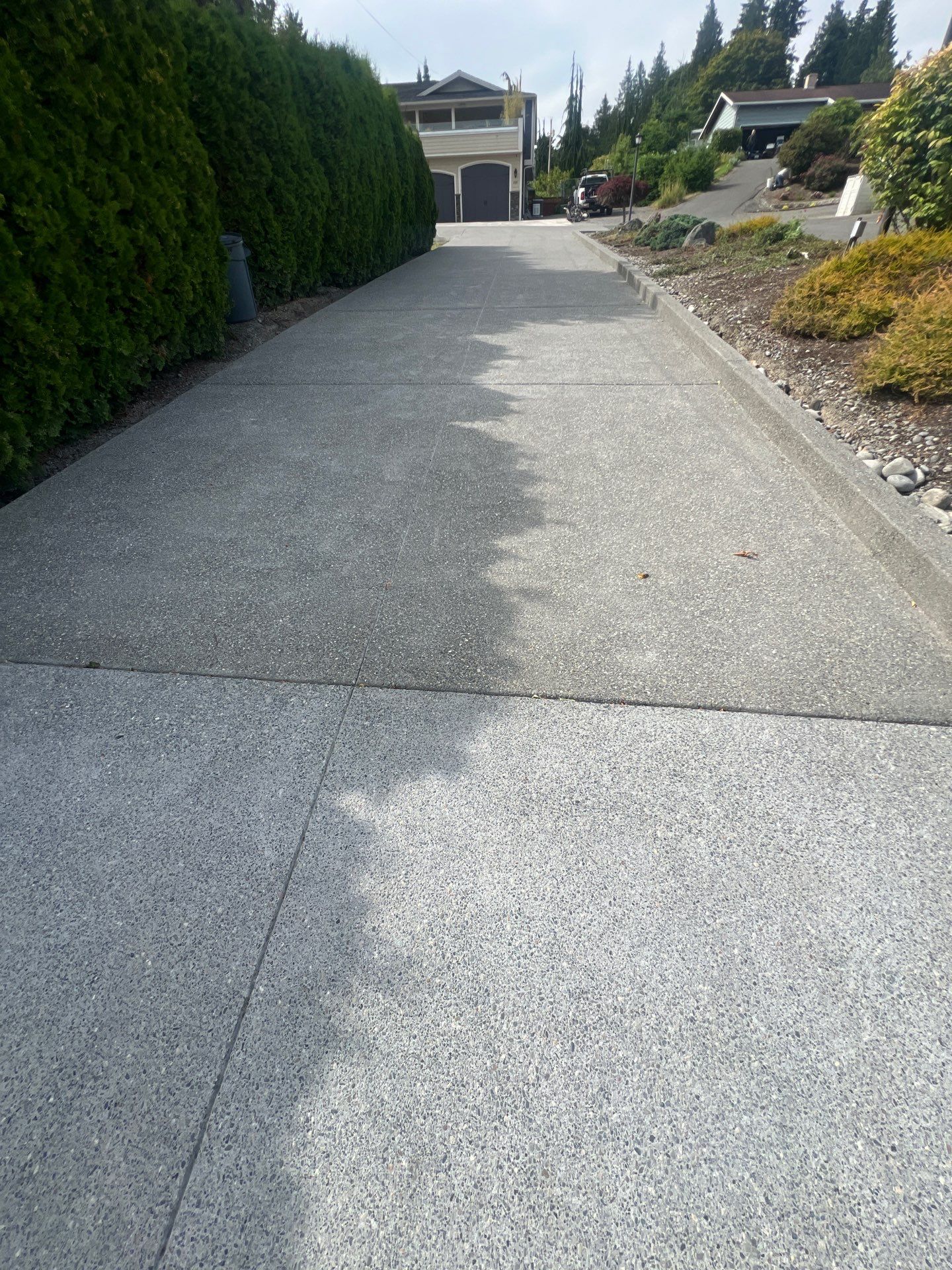 Concrete Driveway Makeover w/ Asphalt Patch | Everett  by Jireh Asphalt & Concrete Inc 