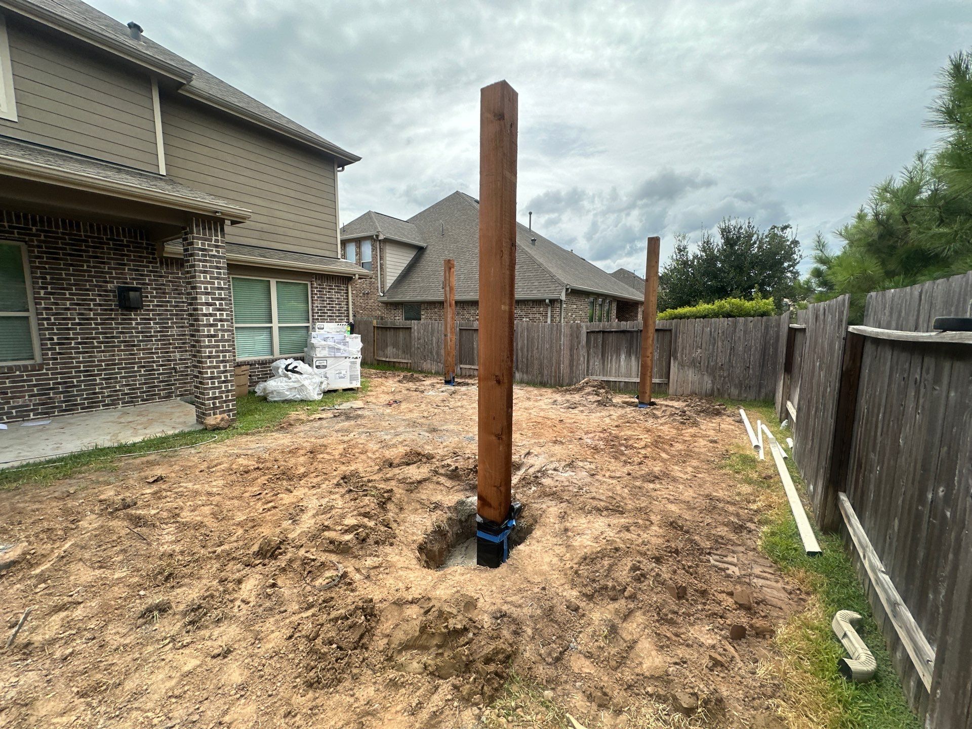 Covered Patio and Summer Kitchen in Spring,  TX by SophAlx LLC