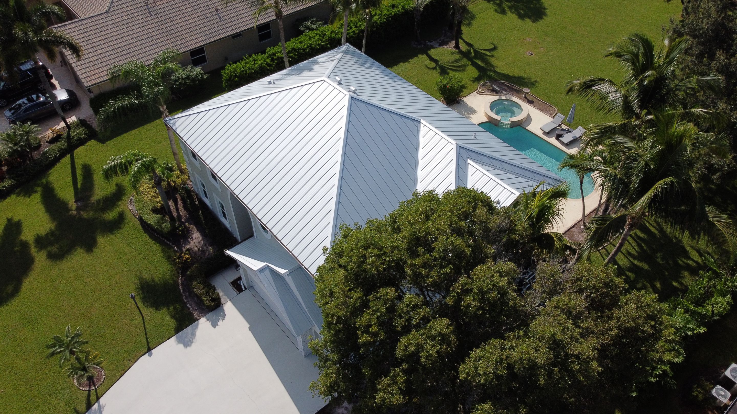 Residential Roofing Installation using 1" Nail strip metal roof by BLUES BROTHERS CONSTRUCTION CORP