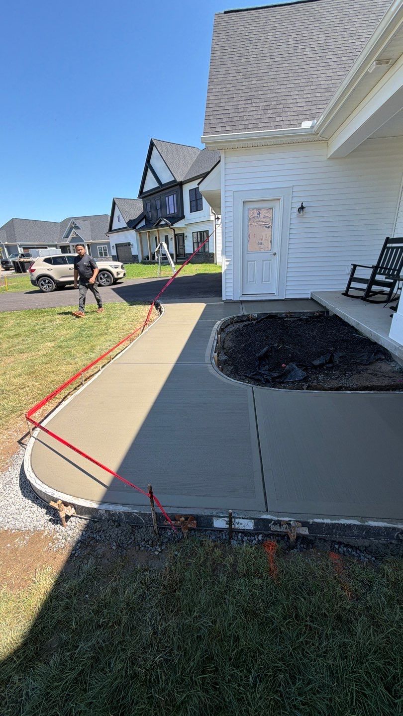 Pittsford Broom Finished Walkway by NG Masonry & Construction LLC