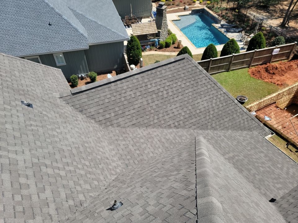 Residential Roofing Installation using Roof Replacement by American Roofing & Construction LLC