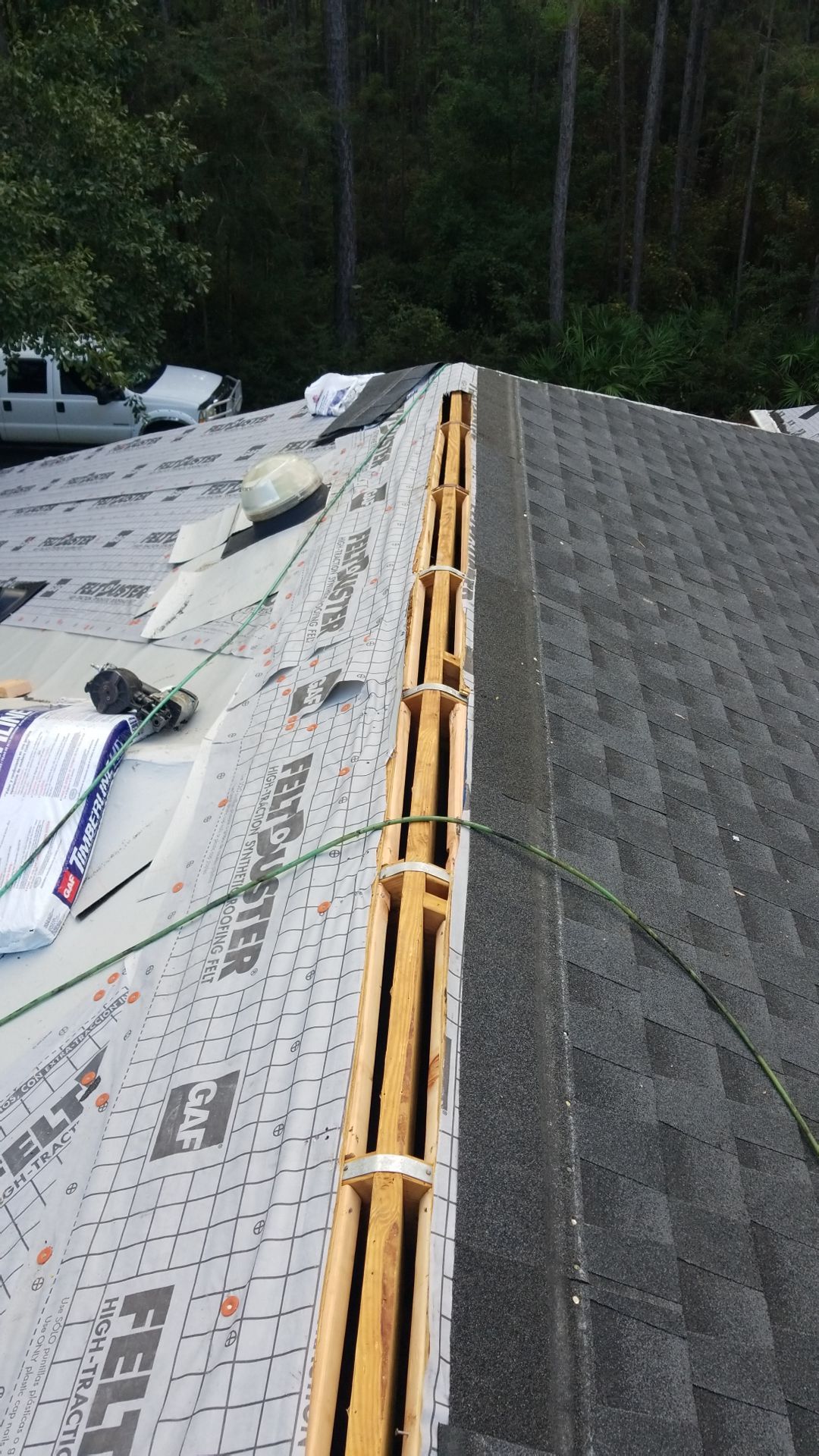 Residential Roofing Installation using Roof Replacement by American Roofing & Construction LLC