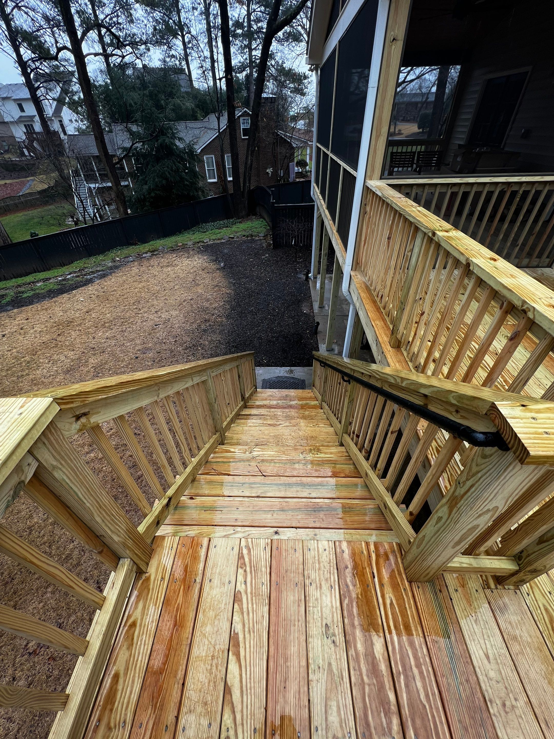 Custom Screened-In Porch and Elevated Deck Construction in Smyrna by Swift Home Renovations