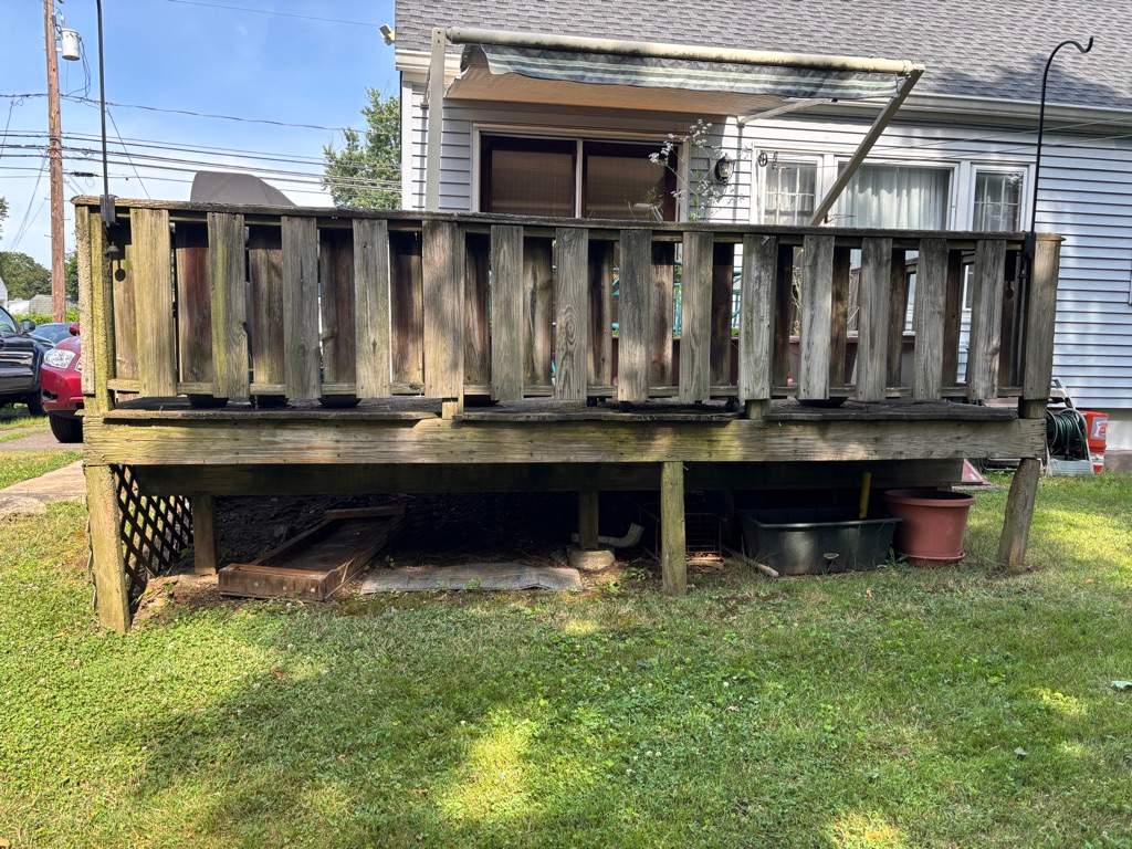 Deck Replacement with Trex Lineage Jasper, Custom Railings and Trex colored fascia by DiGiorgi Roofing and Siding Inc