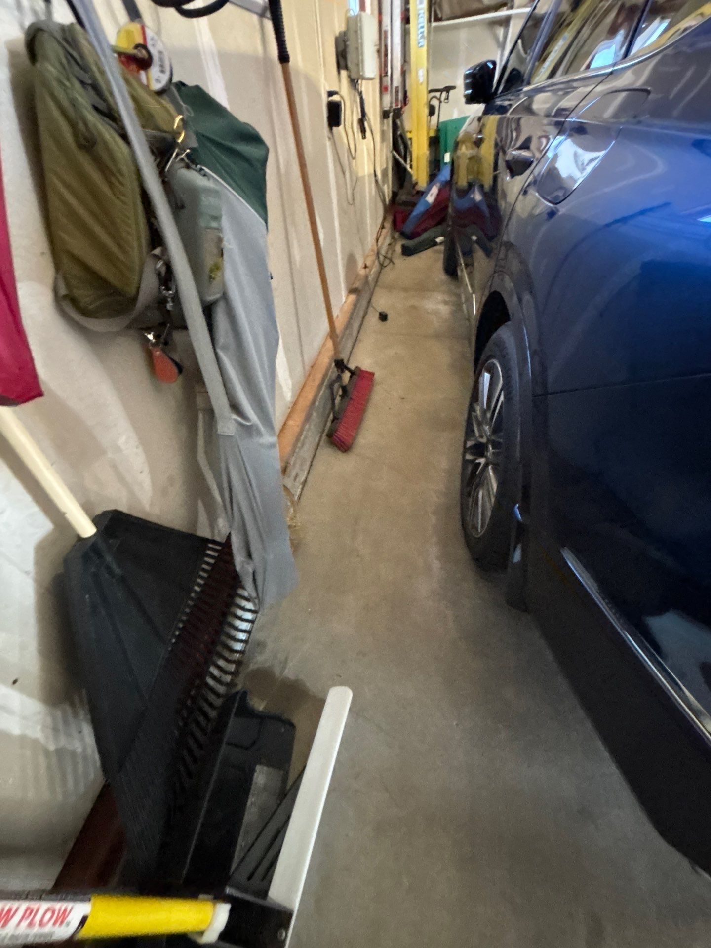 Sioux Falls Garage Concrete Repair and Epoxy Flake Floor Coating by Select Painting, Coatings & Garage Cabinets