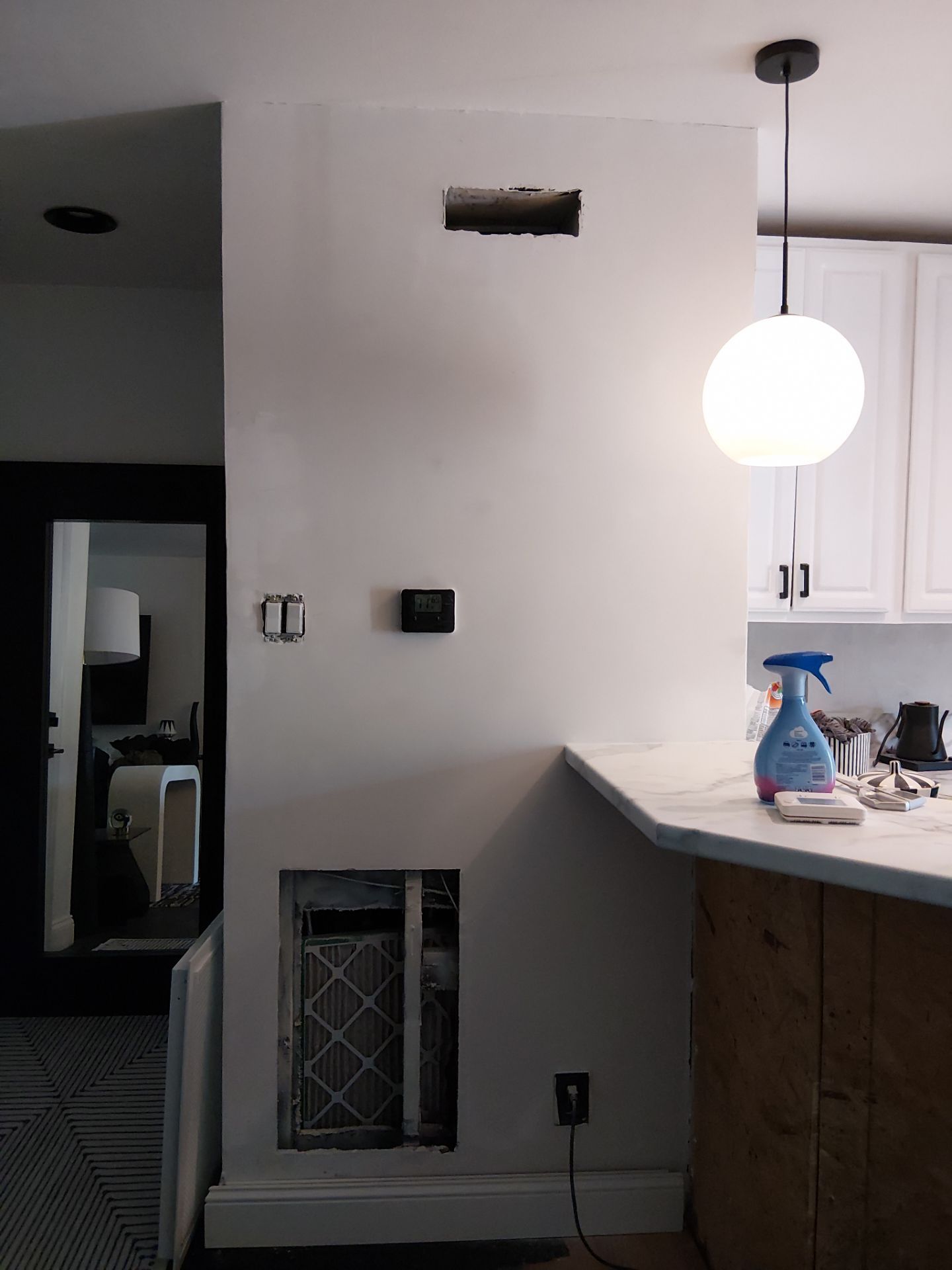 Kitchen Refresh and Hardwood Floor Restoration in Clayton by Legendary Services Company LLC.
