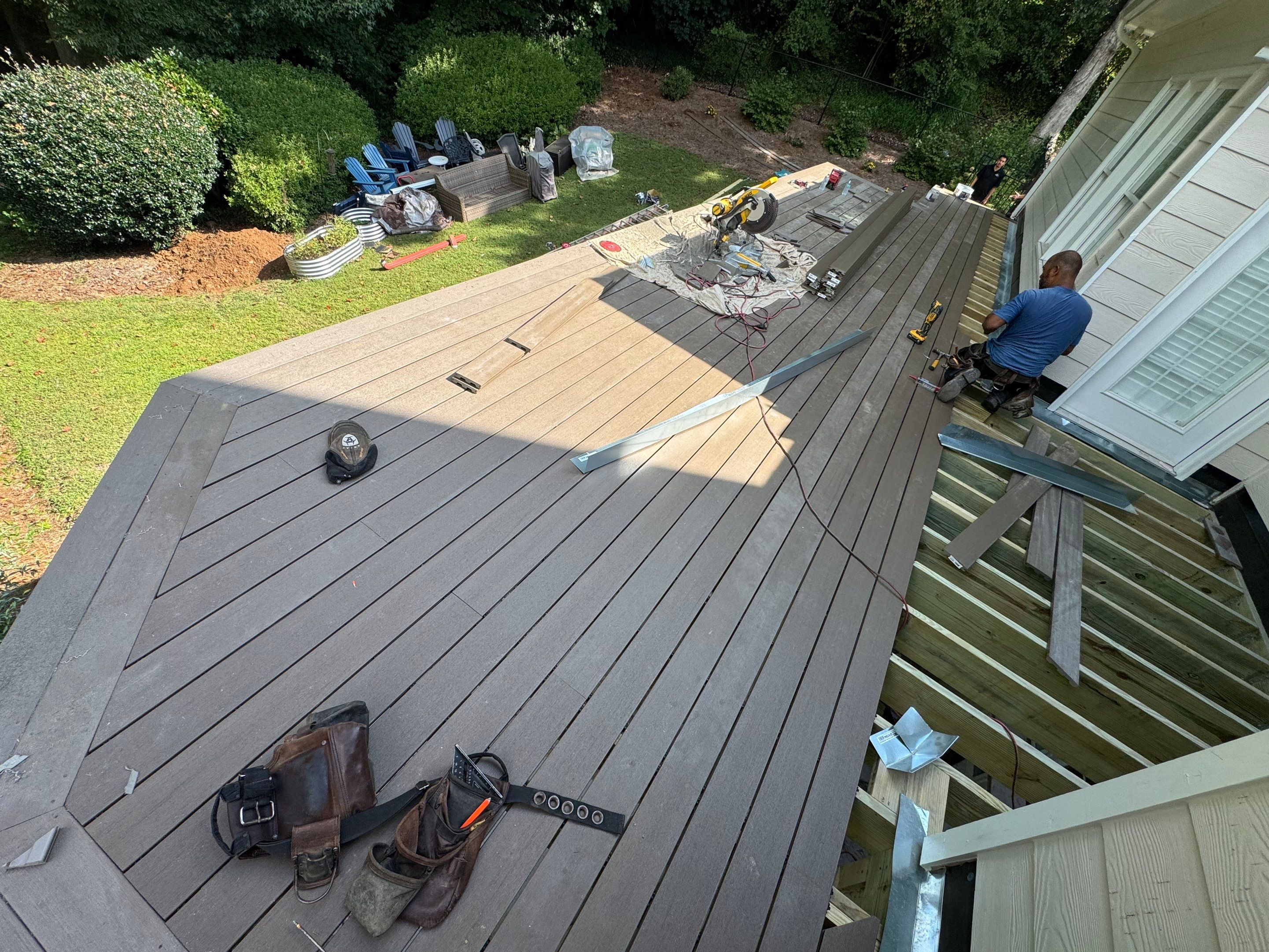 Elevated Composite Deck Replacement with Metal Railings in Smyrna by Swift Home Renovations 