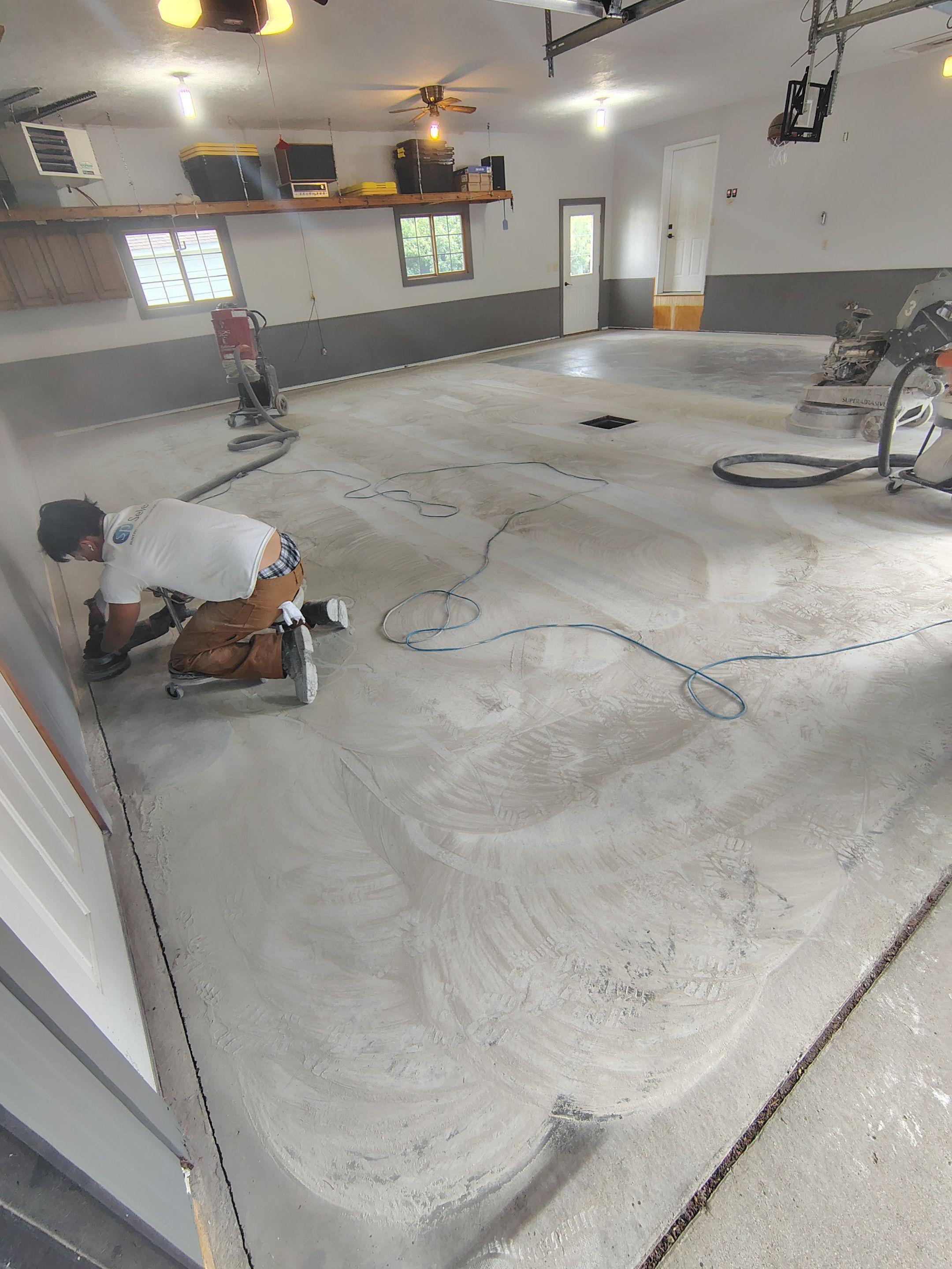 Multi-Fleck Epoxy Garage Floor Coating in Dell Rapids by Select Painting, Coatings & Garage Cabinets