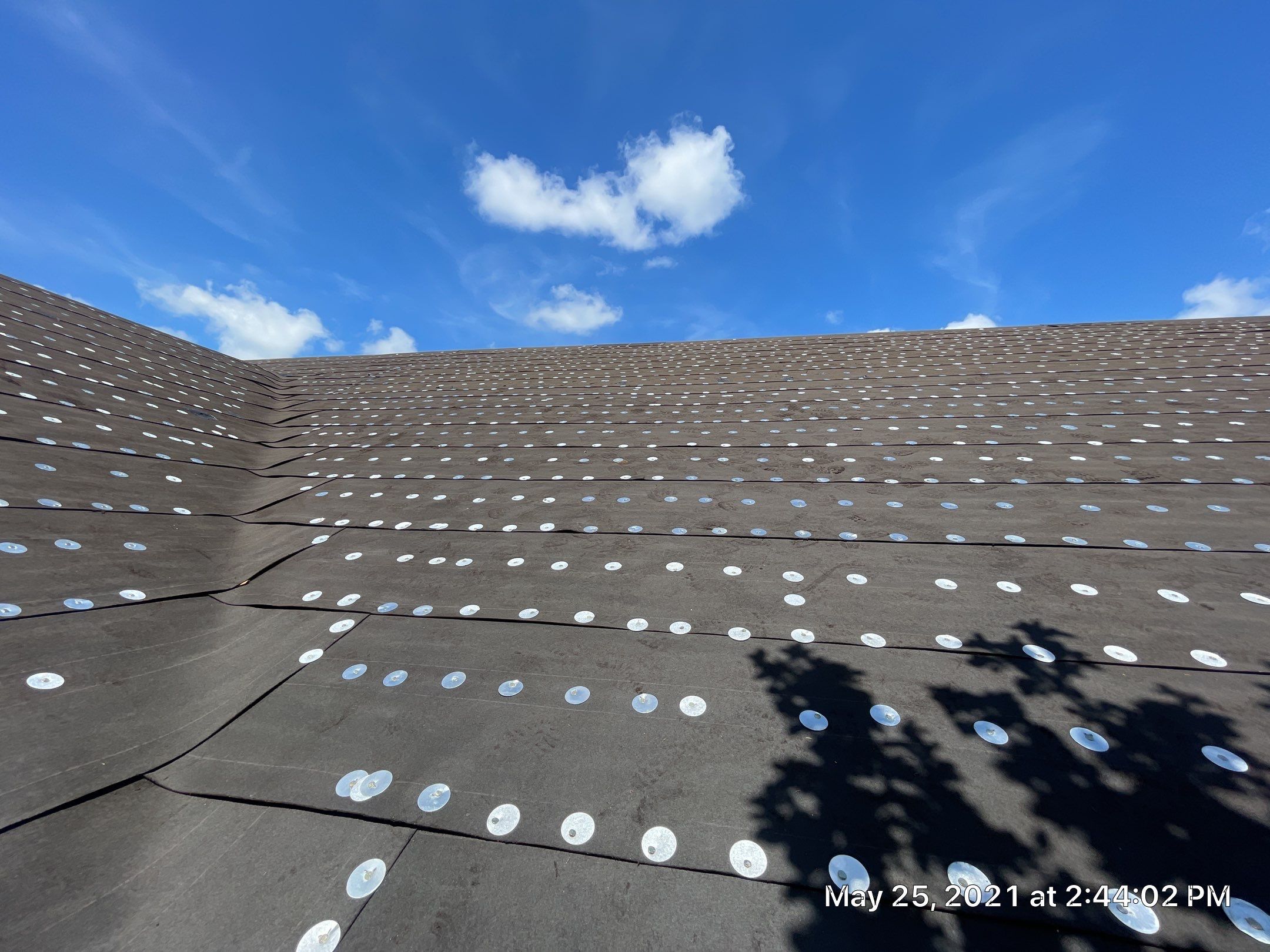 Residential Roofing Installation using 1" Nail strip metal roof by BLUES BROTHERS ROOFING