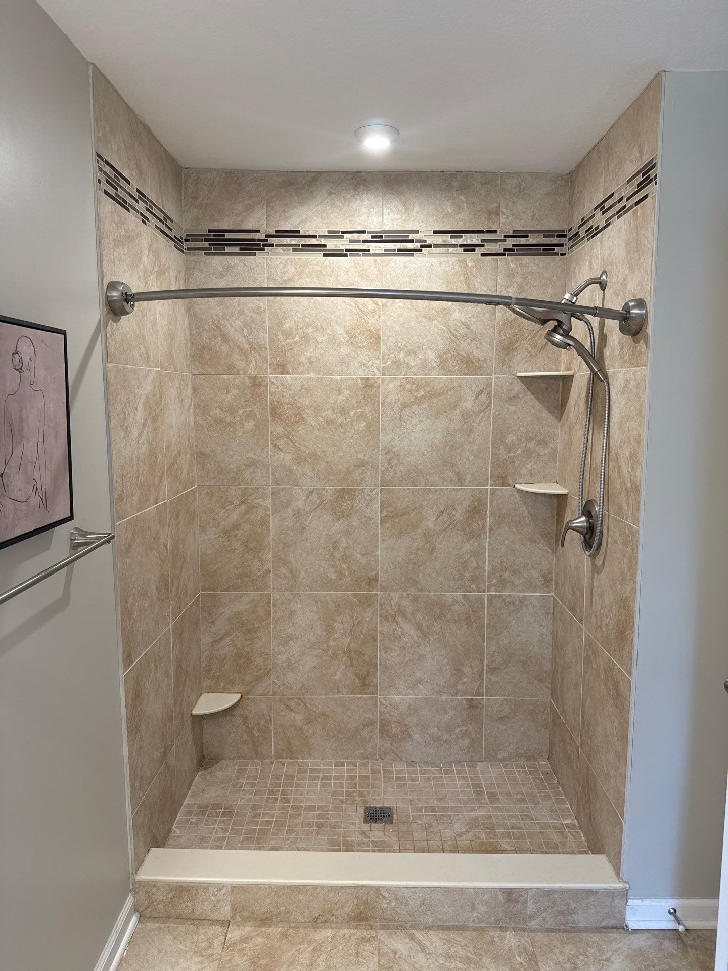 Custom Jacuzzi Walk-In Shower Remodel with Stone-Look Tile in Traverse City by Rainbow Seamless Systems