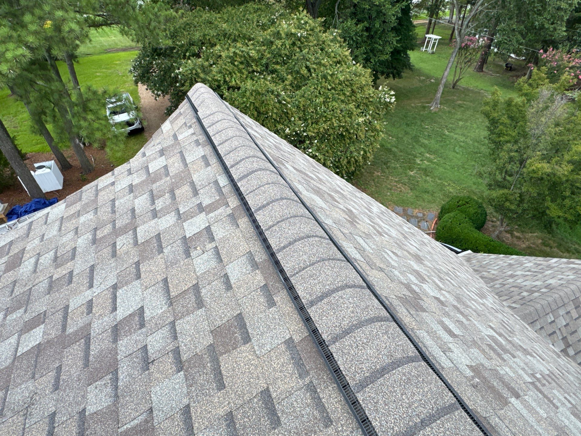 Roof Replacement and White Gutter Installation in Gloucester by Cade Construction