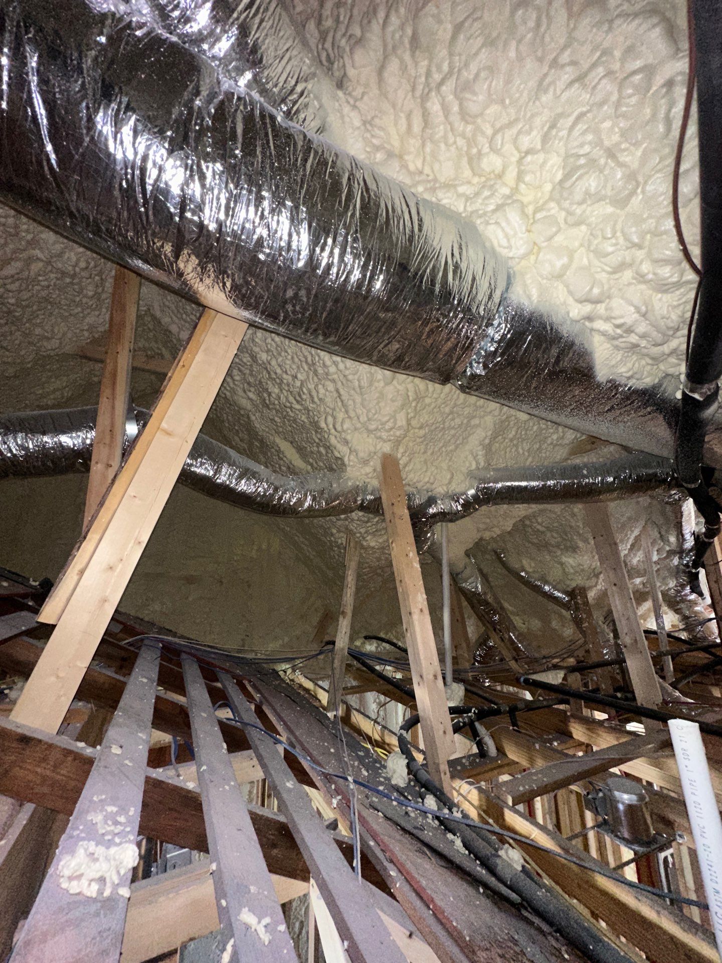 Full encapsulation with open cell spray foam on this custom home in Dallas by Apex Insulation Solutions