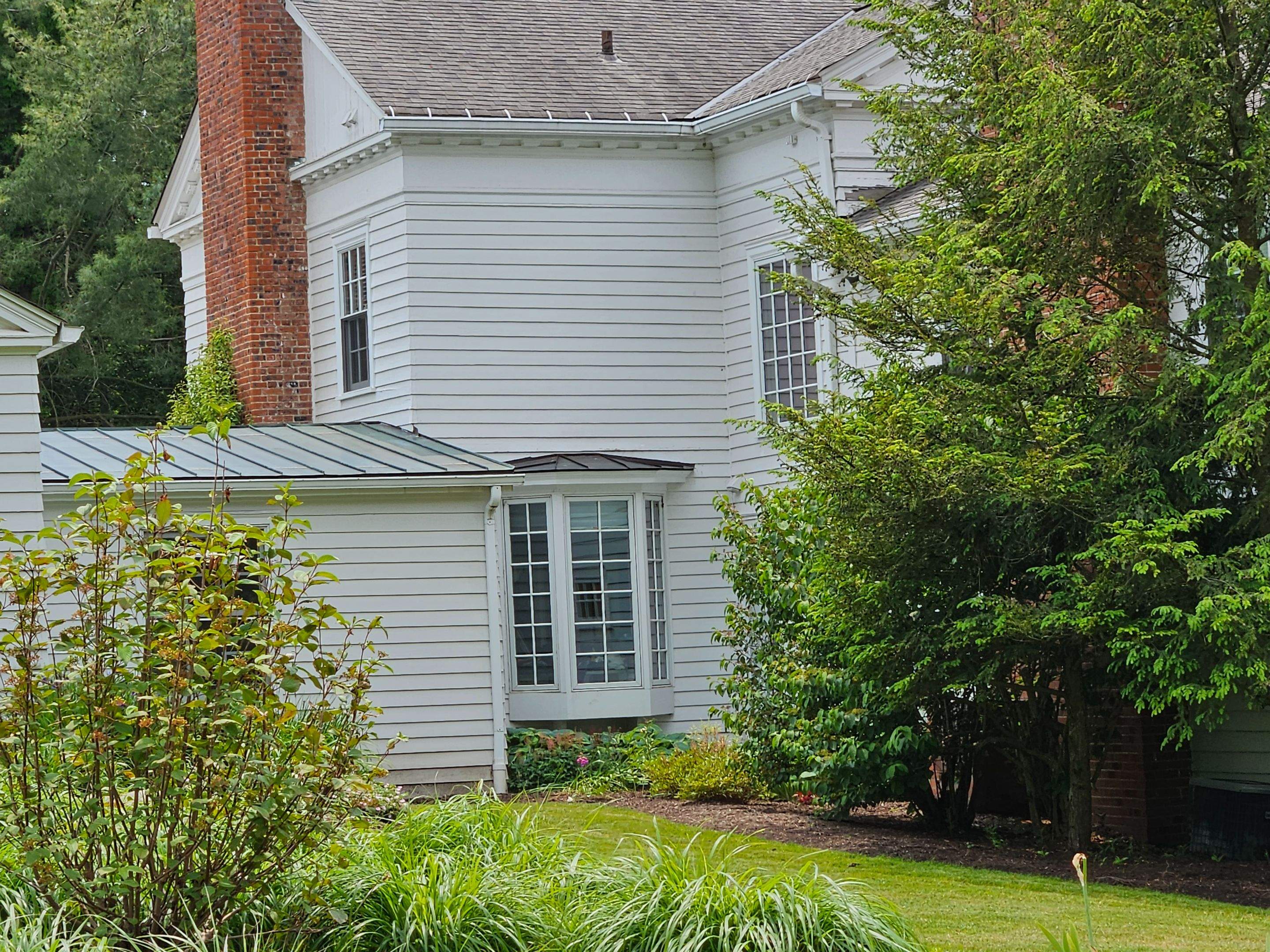 Copper Roof using Copper by Absolute Roofing and Construction