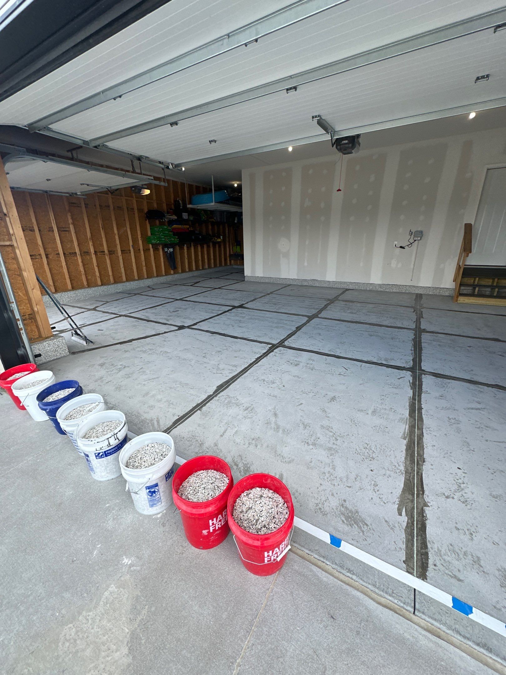 Three-Stall Garage Epoxy Floor Coating Installation in Lincoln by Goat Coatings