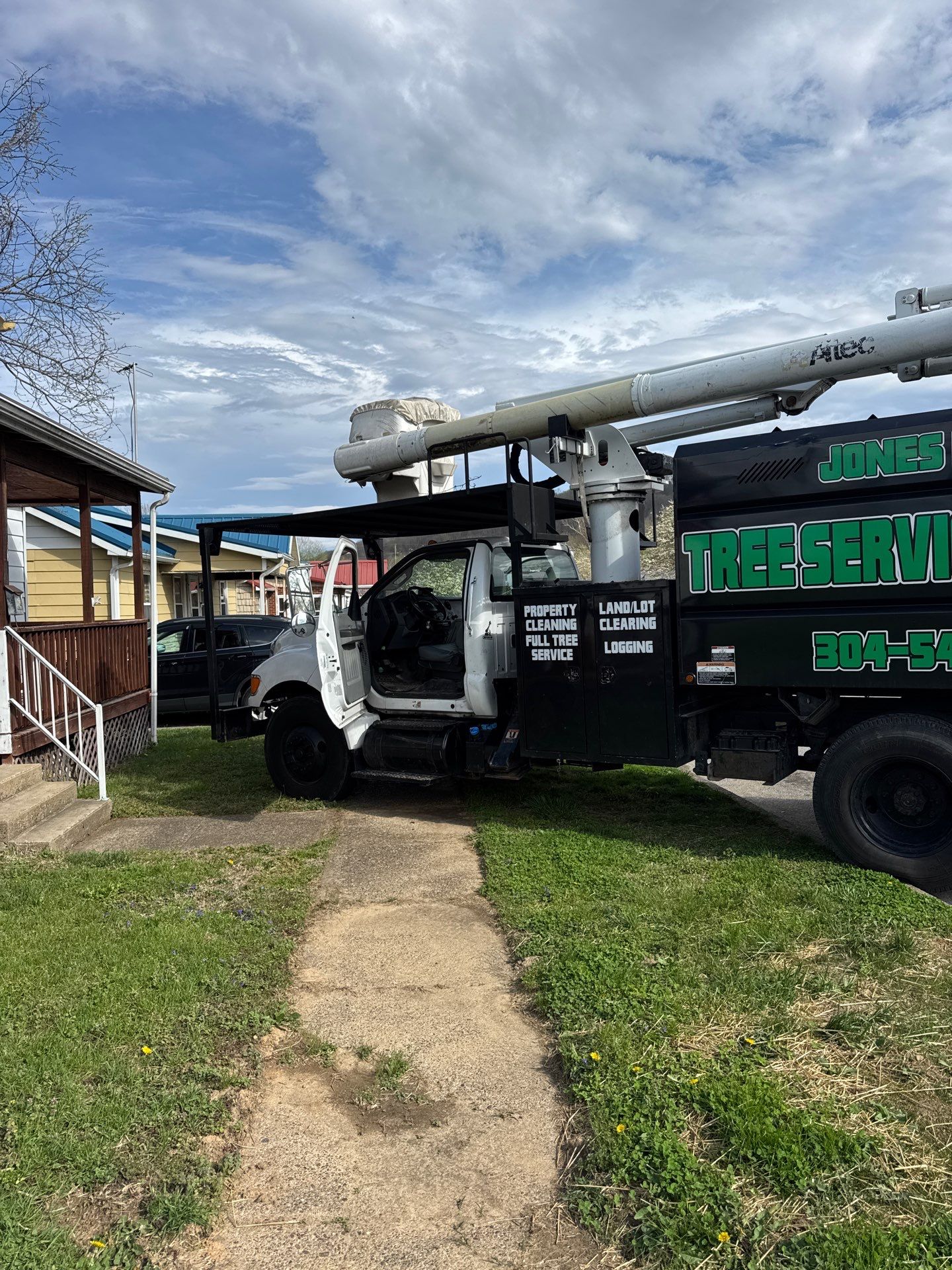 Project in Nitro, WV Rotator Crane Lifts Tree Off House | Nitro WV • One Wrong Move Job | Rotator Crane Tree Removal • Heavy Rescue Tree Job | Nitro WV • Extreme Tree Removal Over Home | Nitro WV by Jones Empire LLC