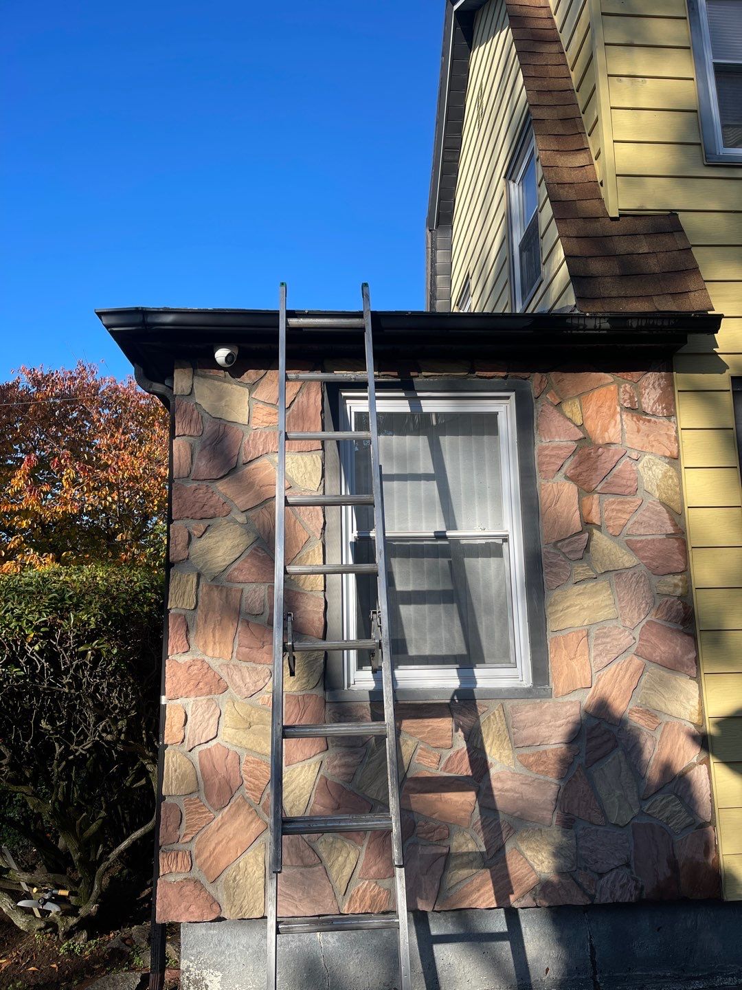 Full House Installation 5" black seamless gutters and 2x3 leaders using 5" black K style seamless gutters and 2x3 black leaders by Above All Gutters