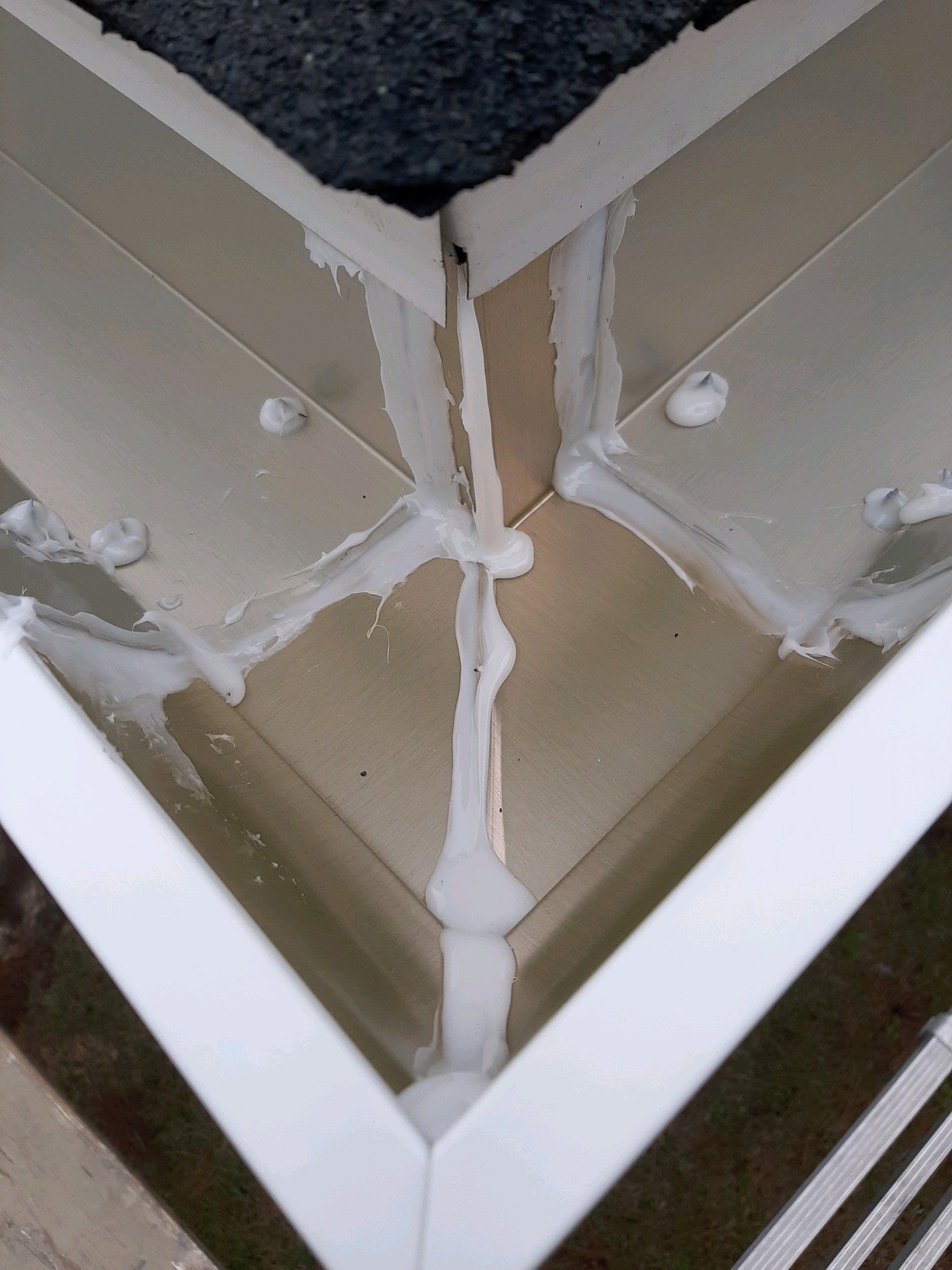 Gutter Installation using White K-Style Seamless Gutters by Gutter Professors