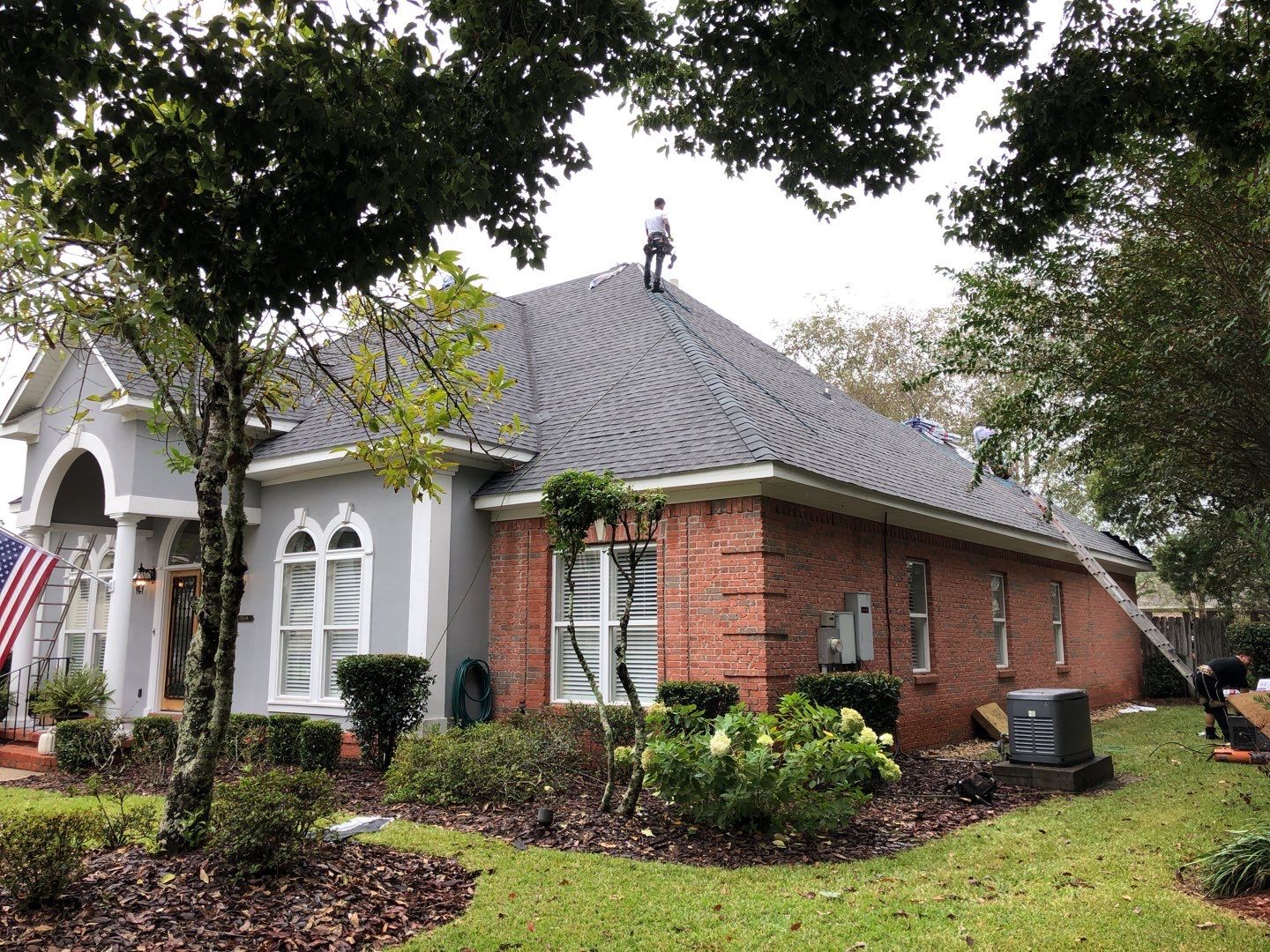 Residential Roofing Installation using Roof Replacement by American Roofing & Construction LLC