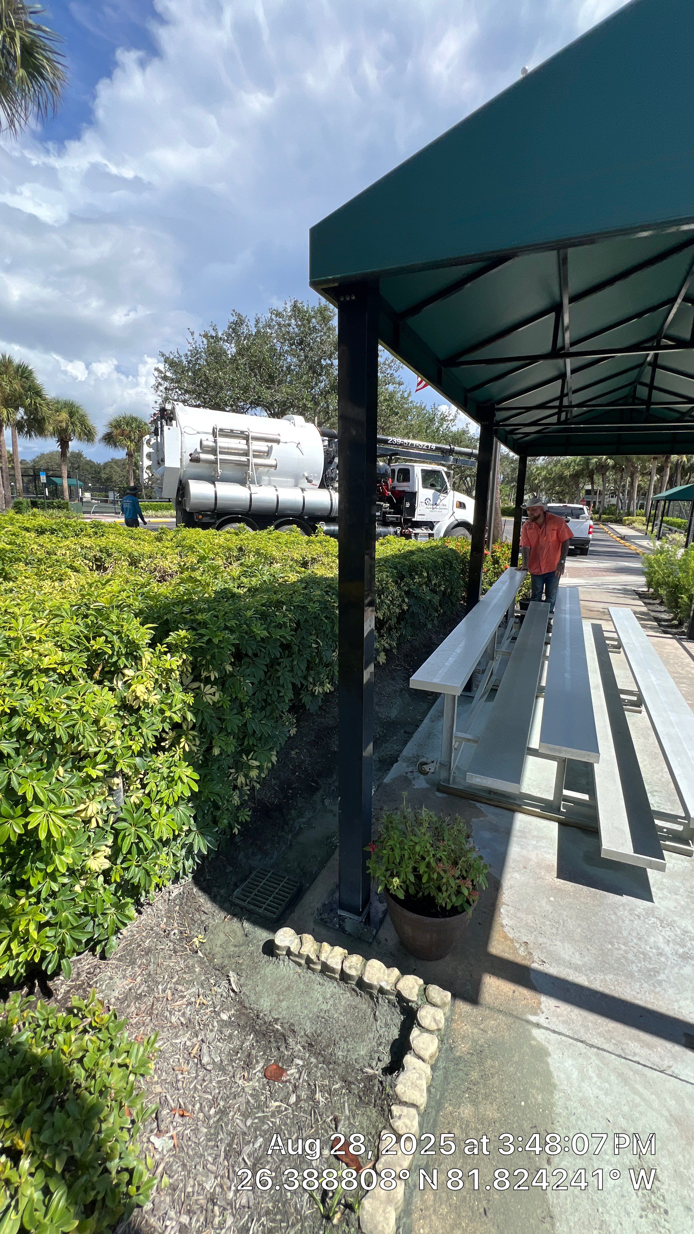 Pelican Landing Tennis Court Catch Basin Cleaning by APS Power & Water
