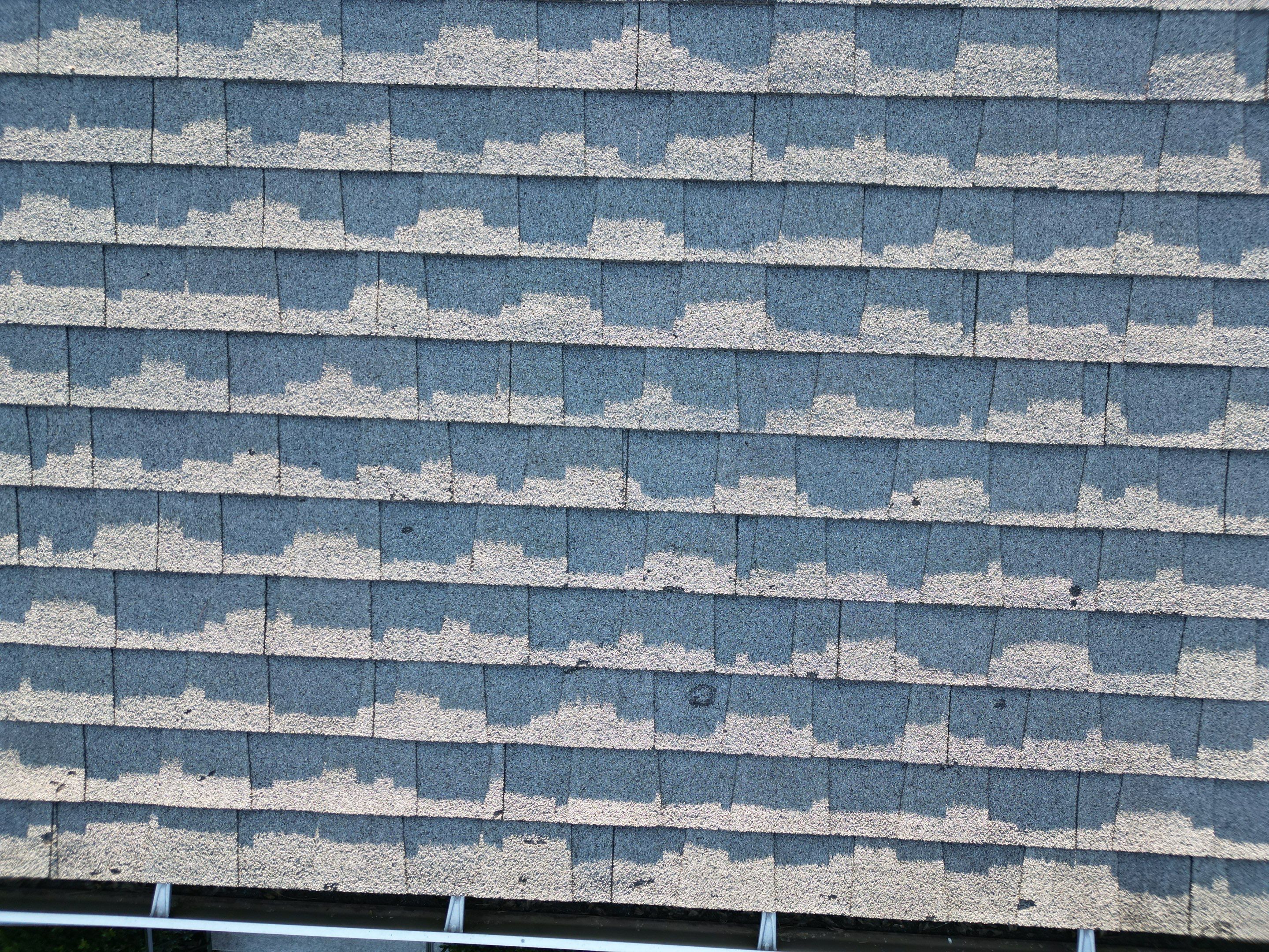 Complete Roof Replacement with Chimney Flashing, Gutter Guard System, and Vinyl Siding Repairs by Mighty Dog Roofing of Greater Middlesex County