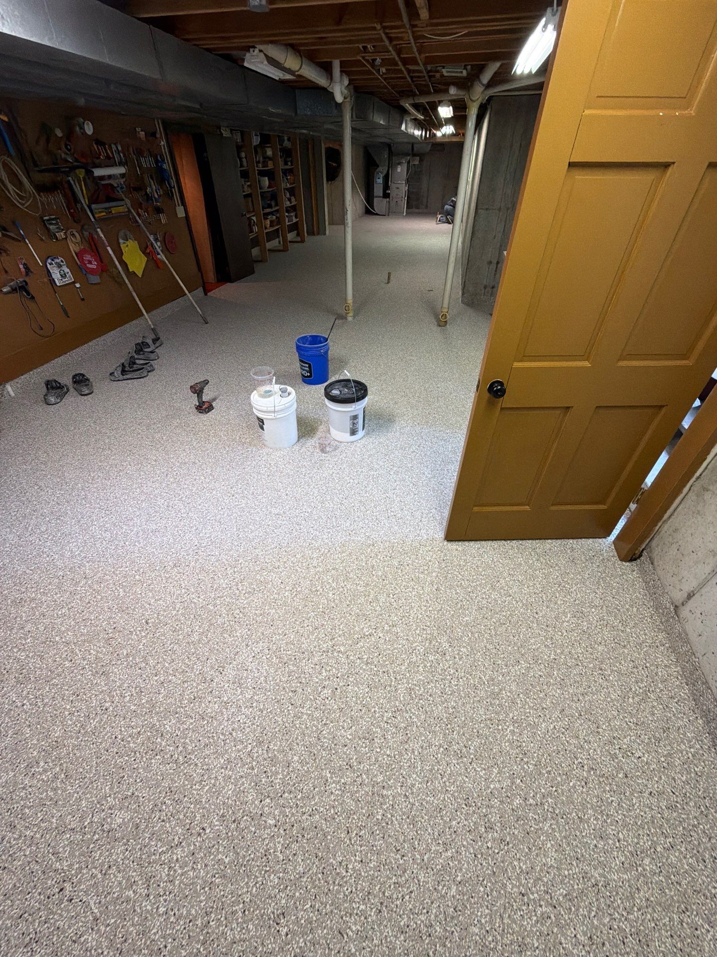 Full Basement and Garage Epoxy Flake Floor Installation in North Muskegon by Gordon Painting