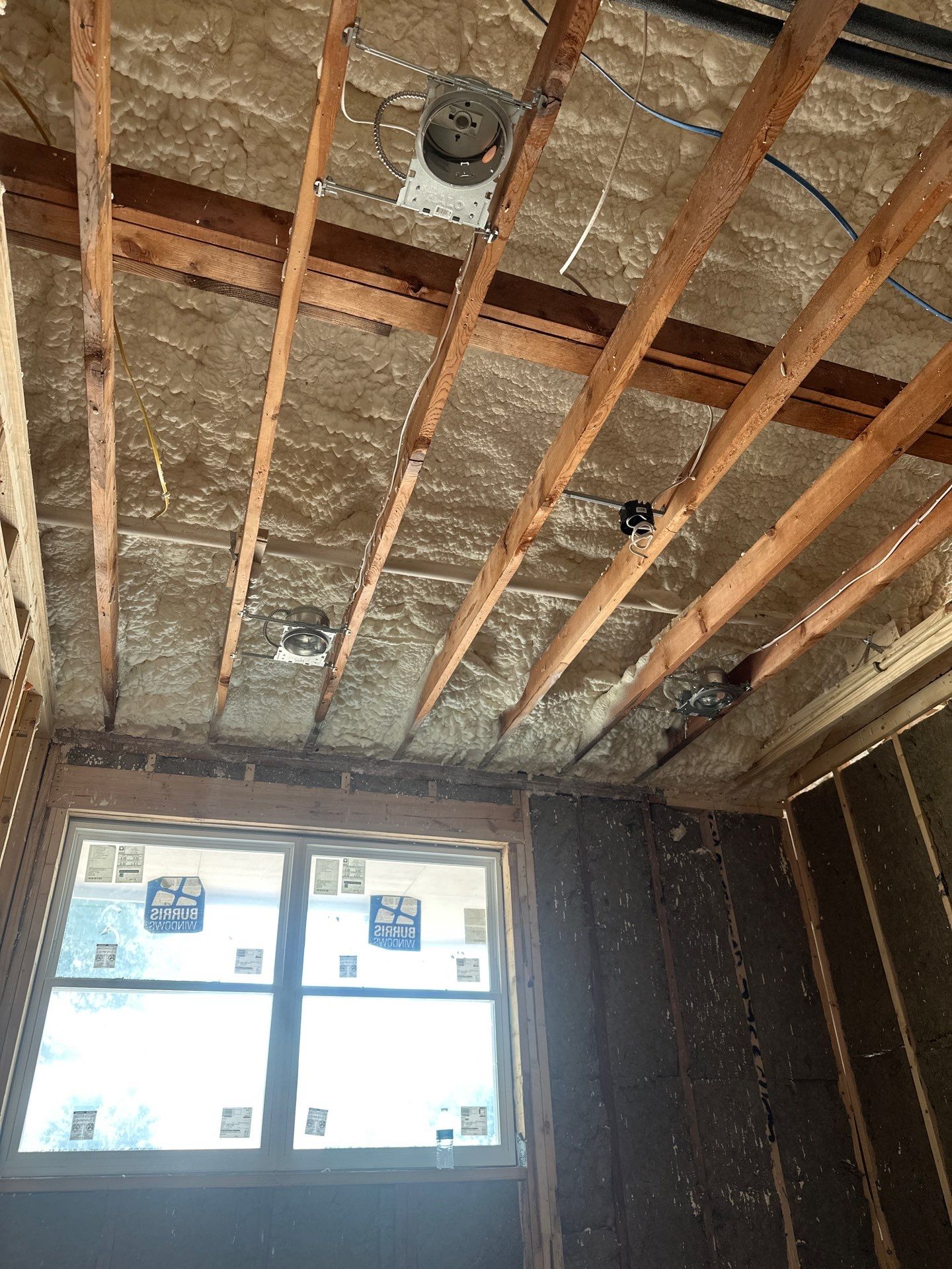 Open cell spray foam & rockwool job completed in Dallas TX by Apex Insulation Solutions