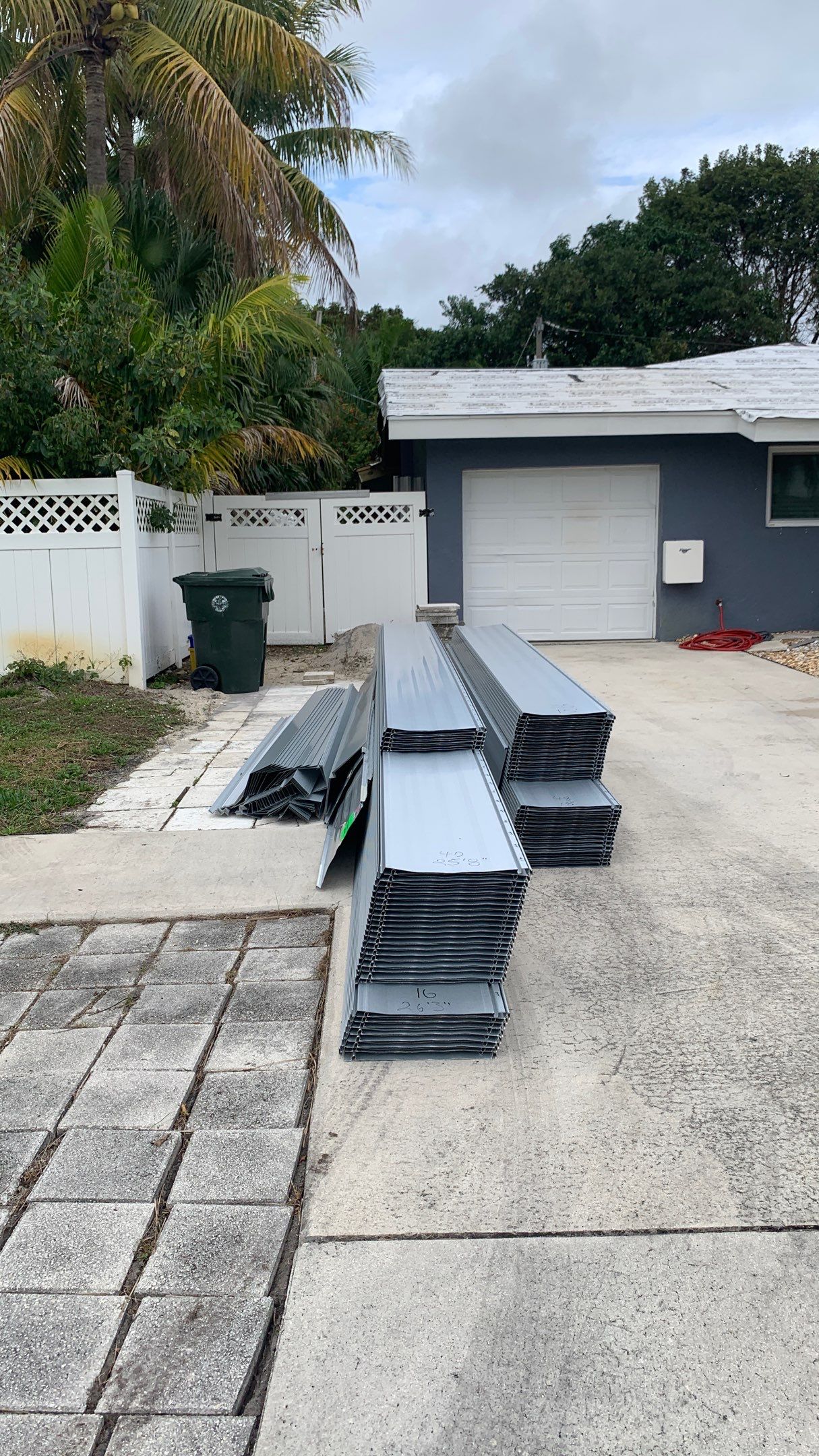 Residential Roofing Installation using 1" Nail strip metal roof by BLUES BROTHERS ROOFING