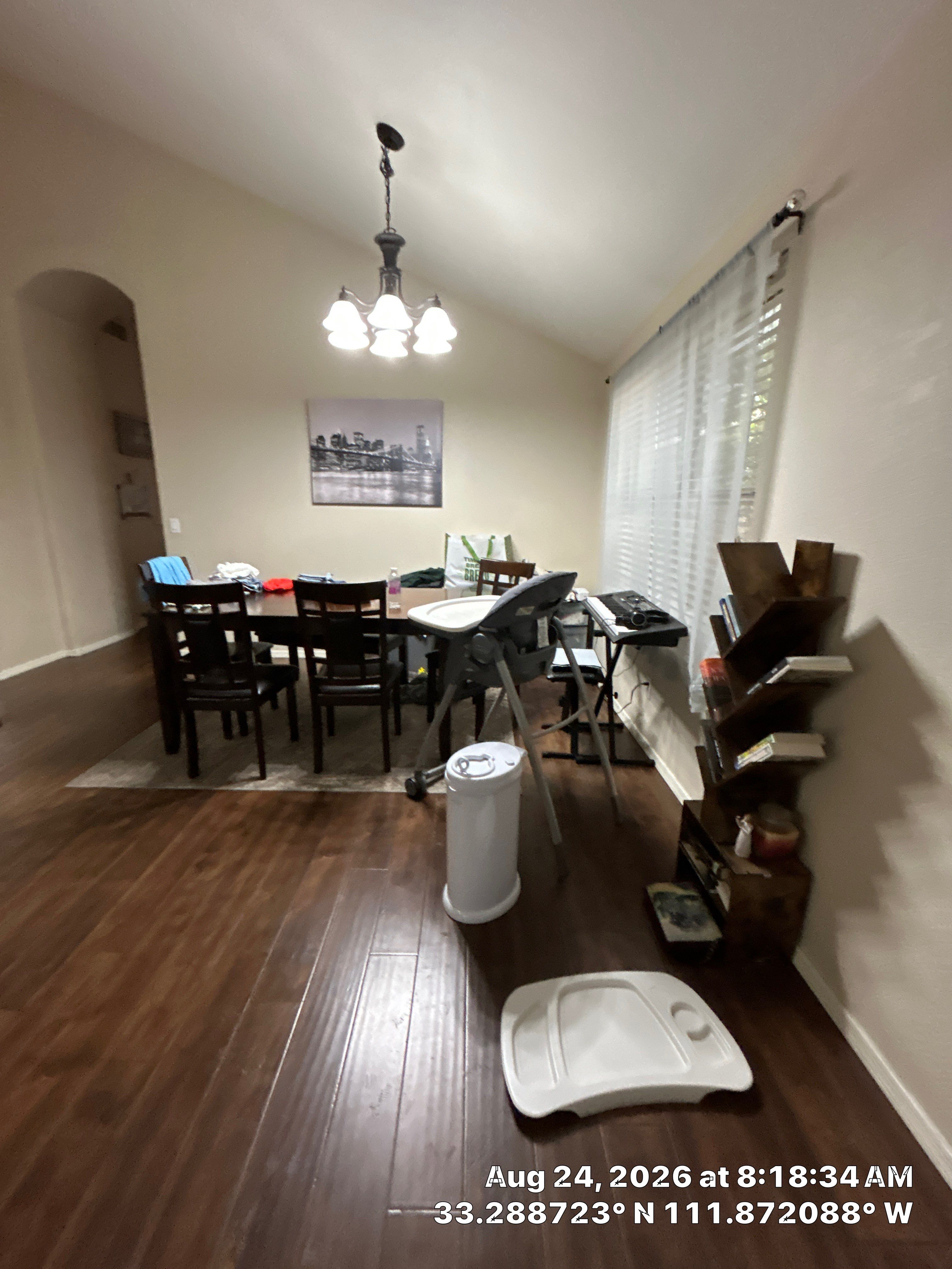 Dining Room Remodel Featuring Dark Wood Laminate Flooring in Chandler by CompanyCam Sales Demo