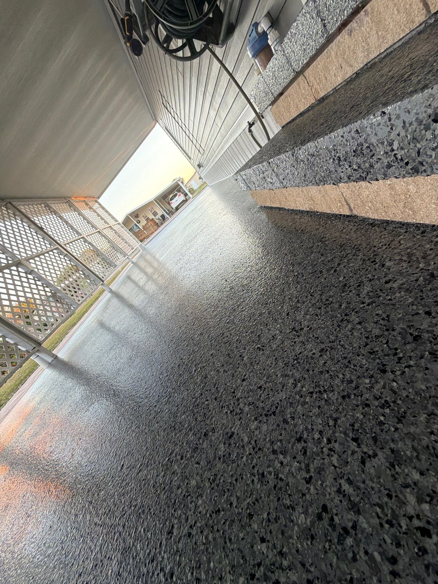 Driveway Transformation: Nightfall Flake System with Full UV & Moisture Protection by Performance Floors & Coating