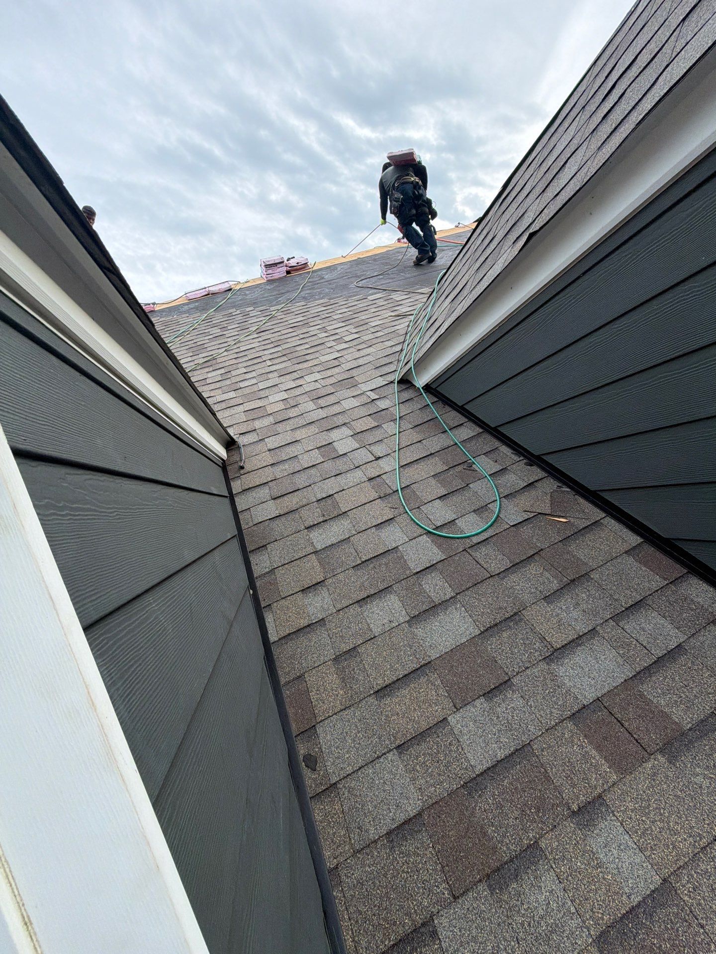 Roof Replacement and White Gutter Installation in Gloucester by Cade Construction