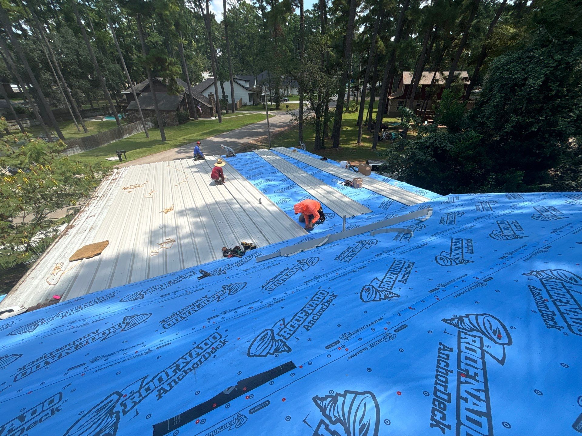 White Standing Seam Metal Roof Replacement in Willis, Texas by Abbott Roofing Company