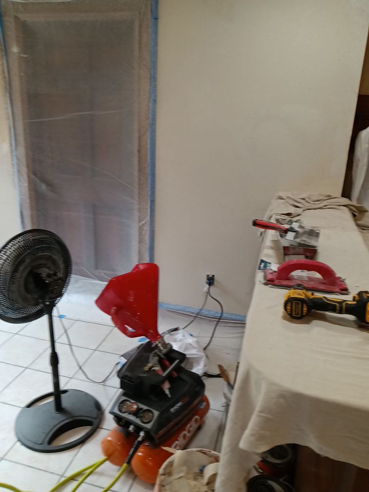 Interior and exterior painting project by Roof Concepts Construction