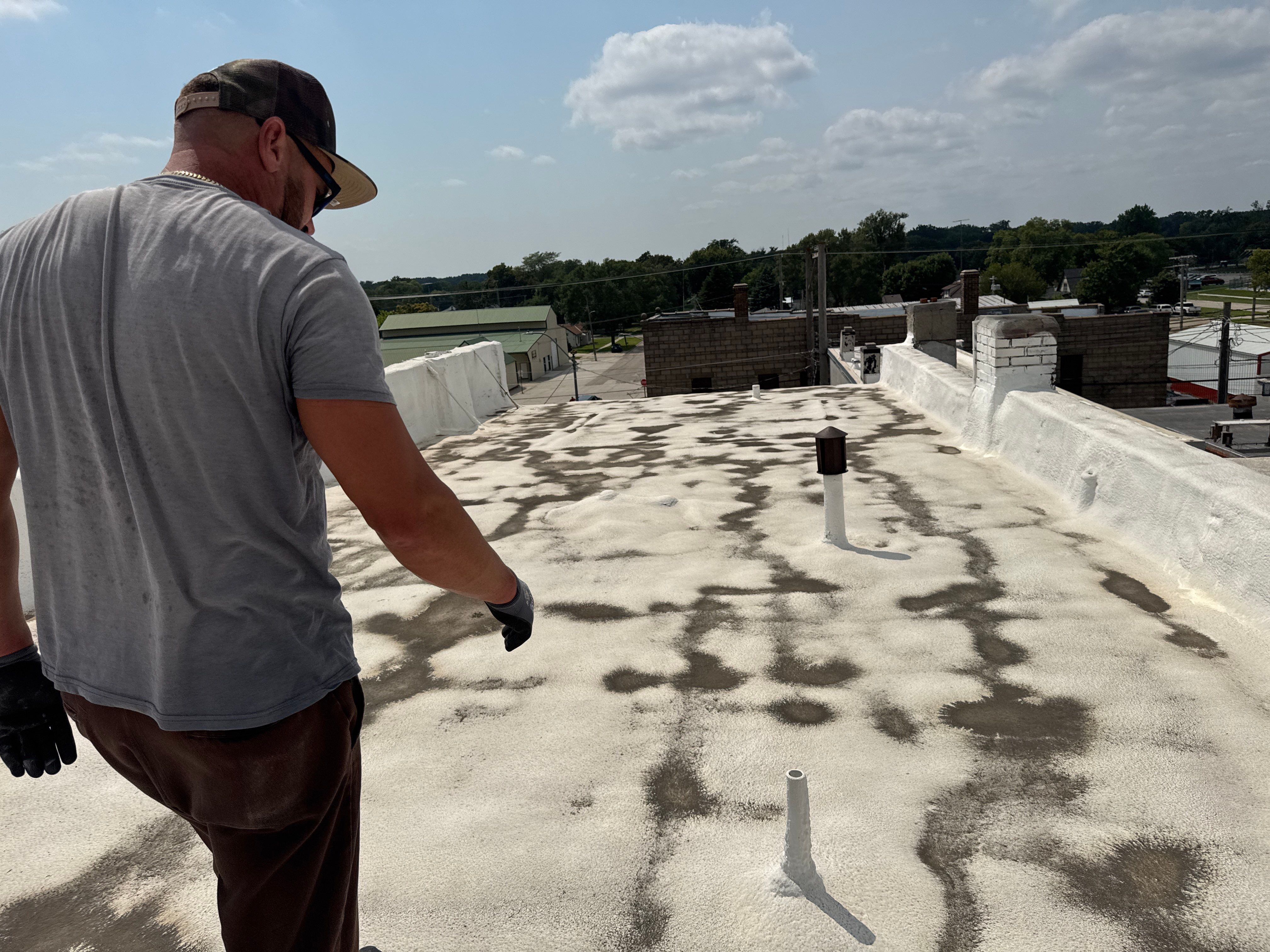 Commercial Flat Roof Elastomeric Coating and Repair in West Point by Crows Roofing LLC