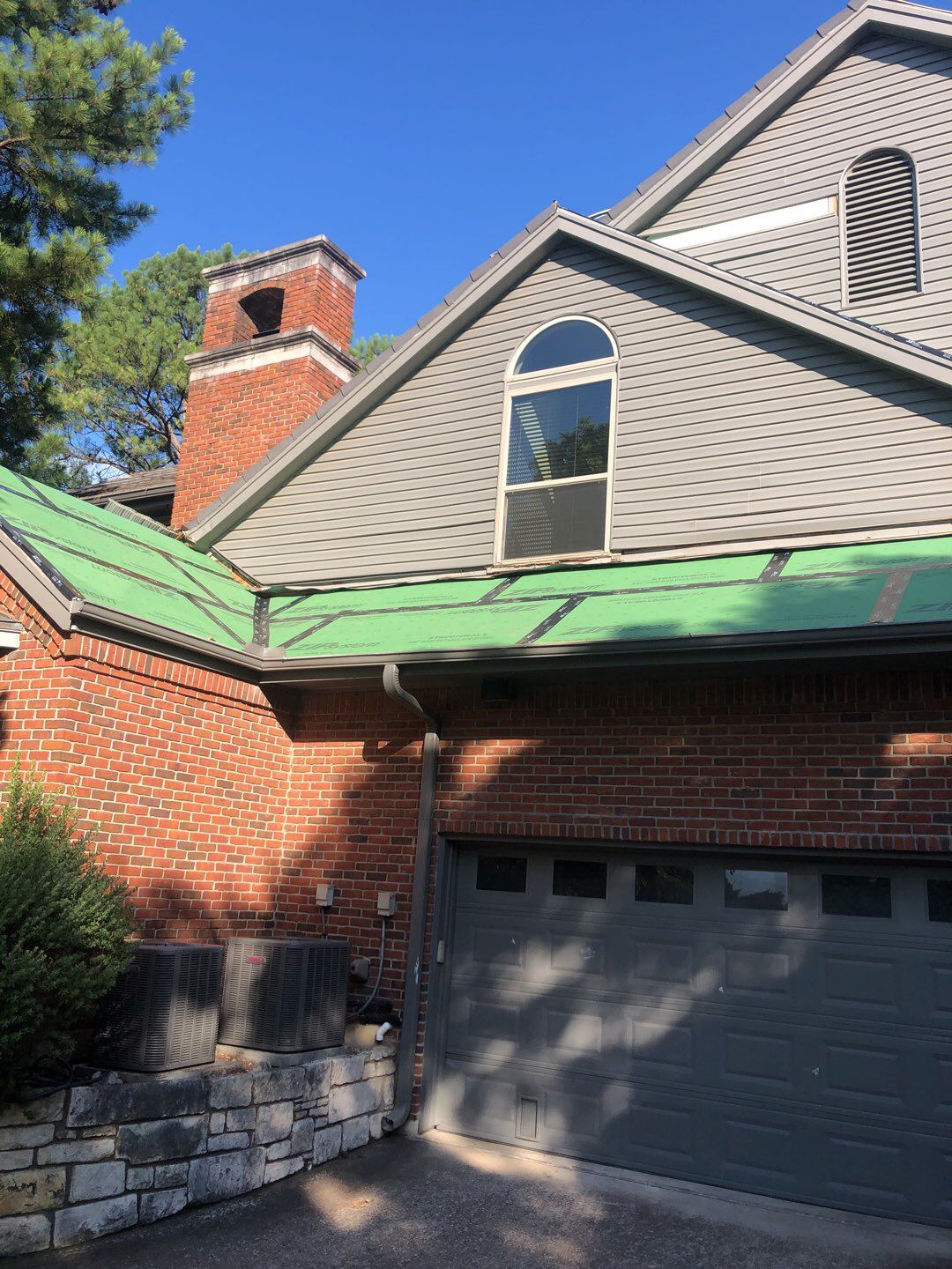 Designer Residential Roof with Zip System by Springtree Restoration