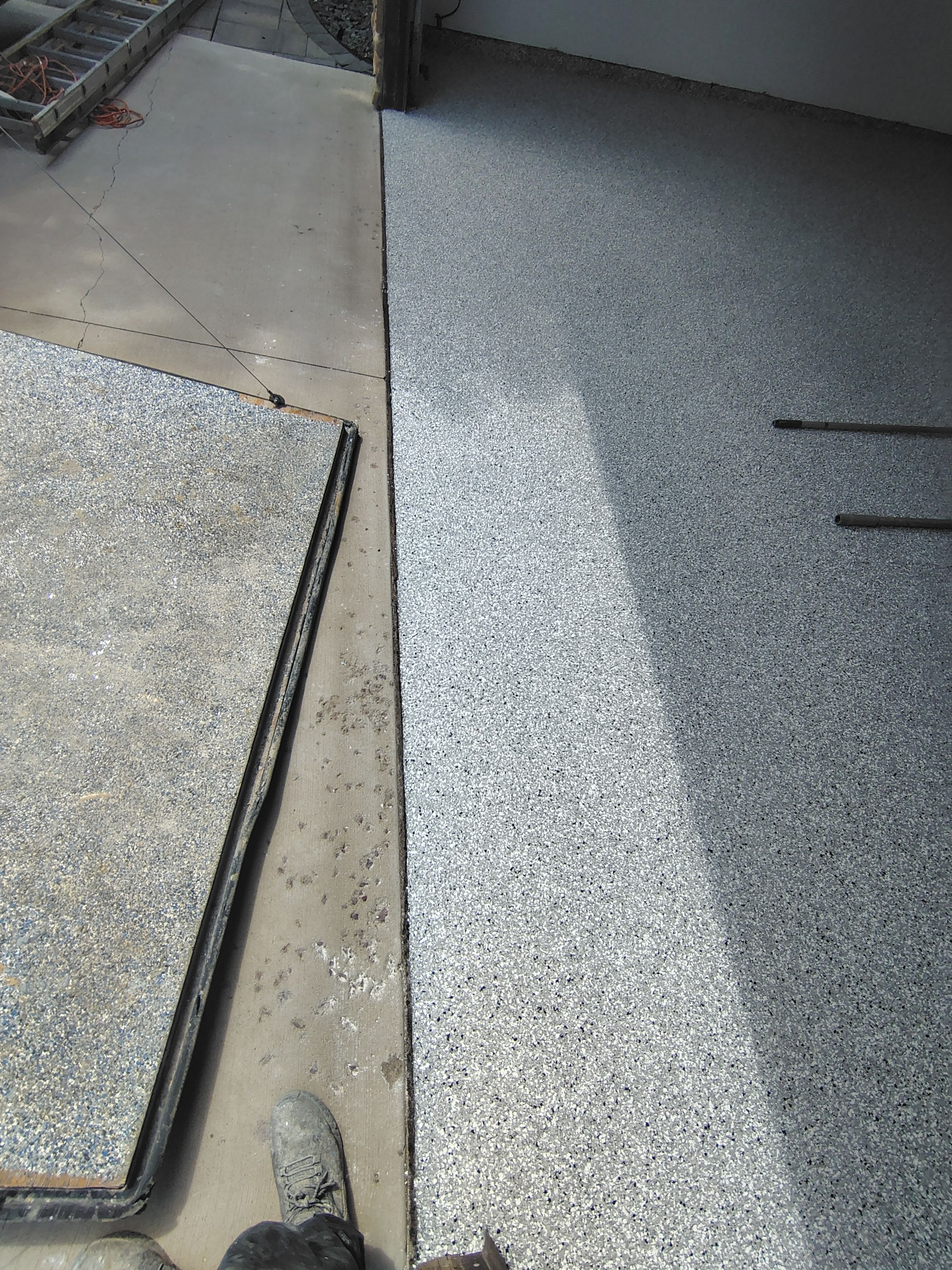 Sioux Falls Garage Floor Coating with Speckled Flake Finish by Select Painting, Coatings & Garage Cabinets